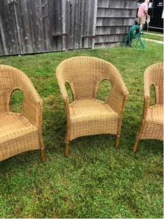 Ensemble de quatre chaises vintage en osier tressé