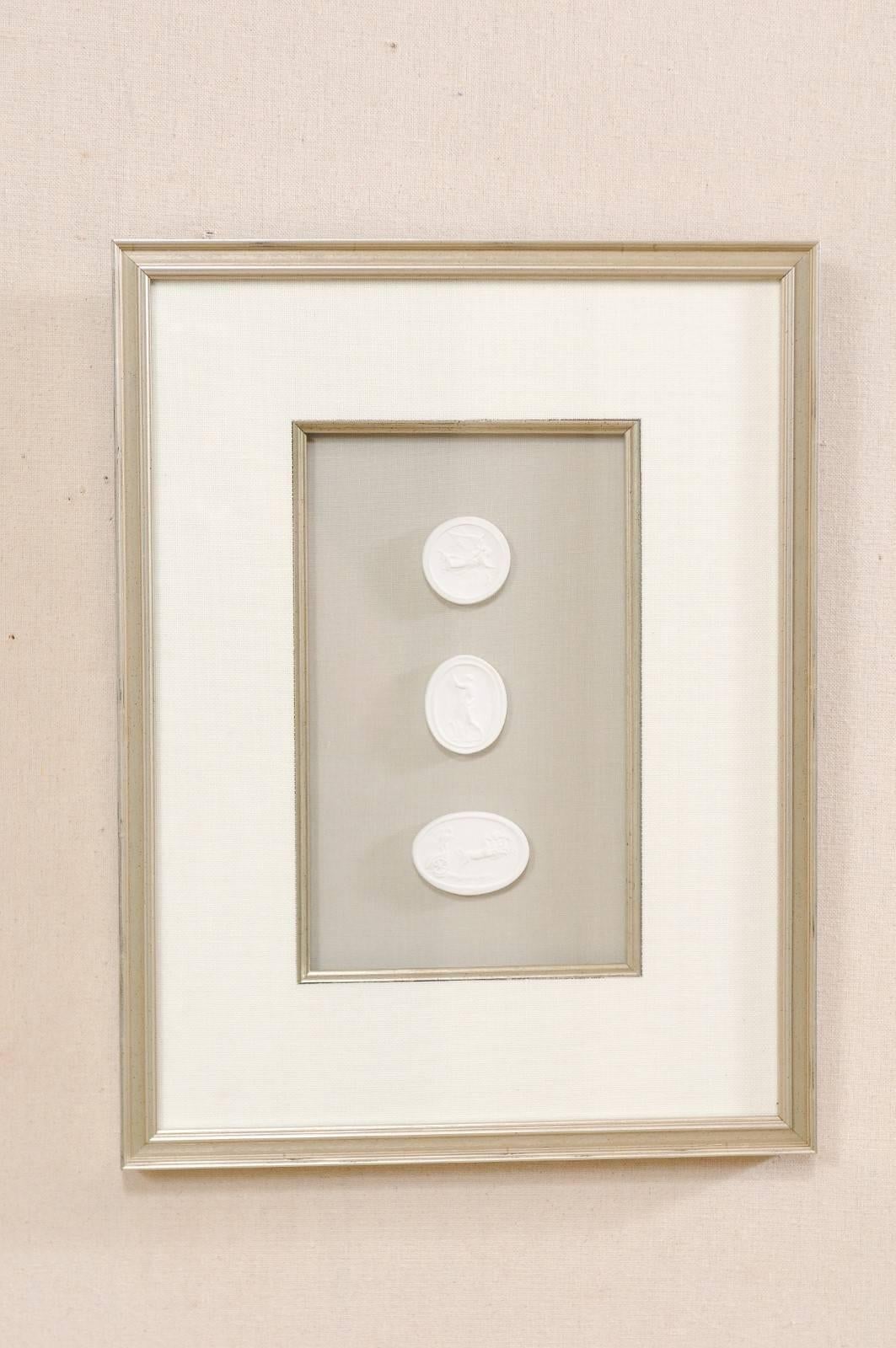 Greco Roman Set of Four Wall Decorations of Hand-Cast White Intaglios in Silver Leaf Frames