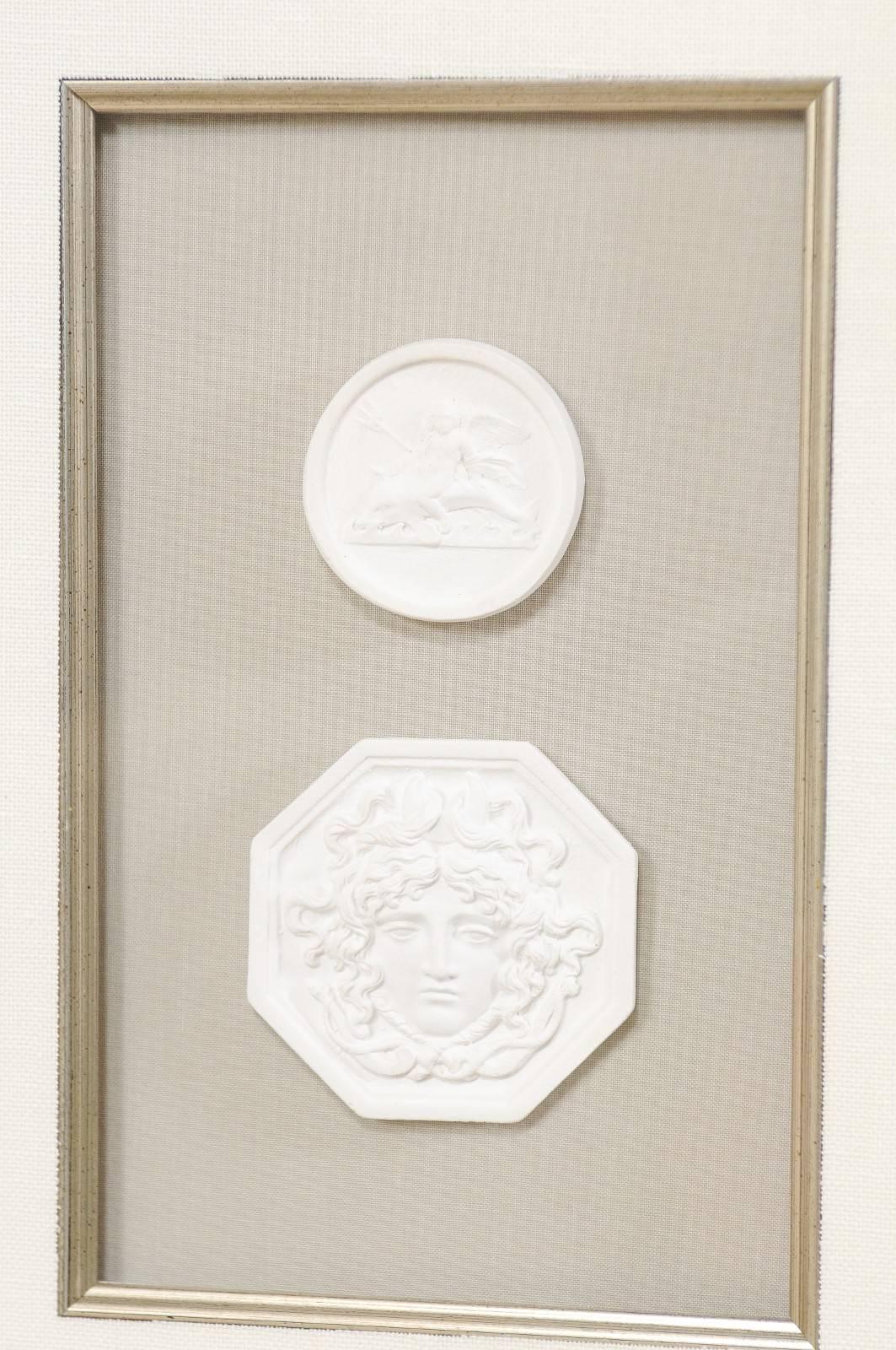 Set of Four Wall Decorations of Hand-Cast White Intaglios in Silver Leaf Frames In Excellent Condition In Atlanta, GA