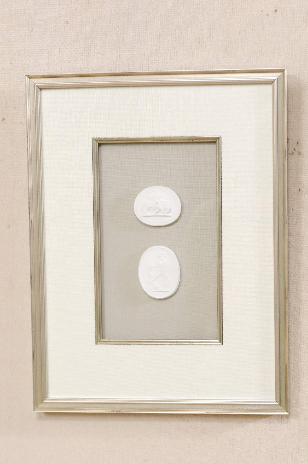 Set of Four Wall Decorations of Hand-Cast White Intaglios in Silver Leaf Frames 1