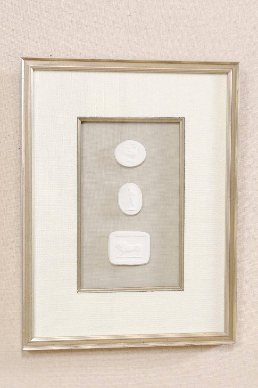 Set of Four Wall Decorations of Hand-Cast White Intaglios in Silver Leaf Frames 2