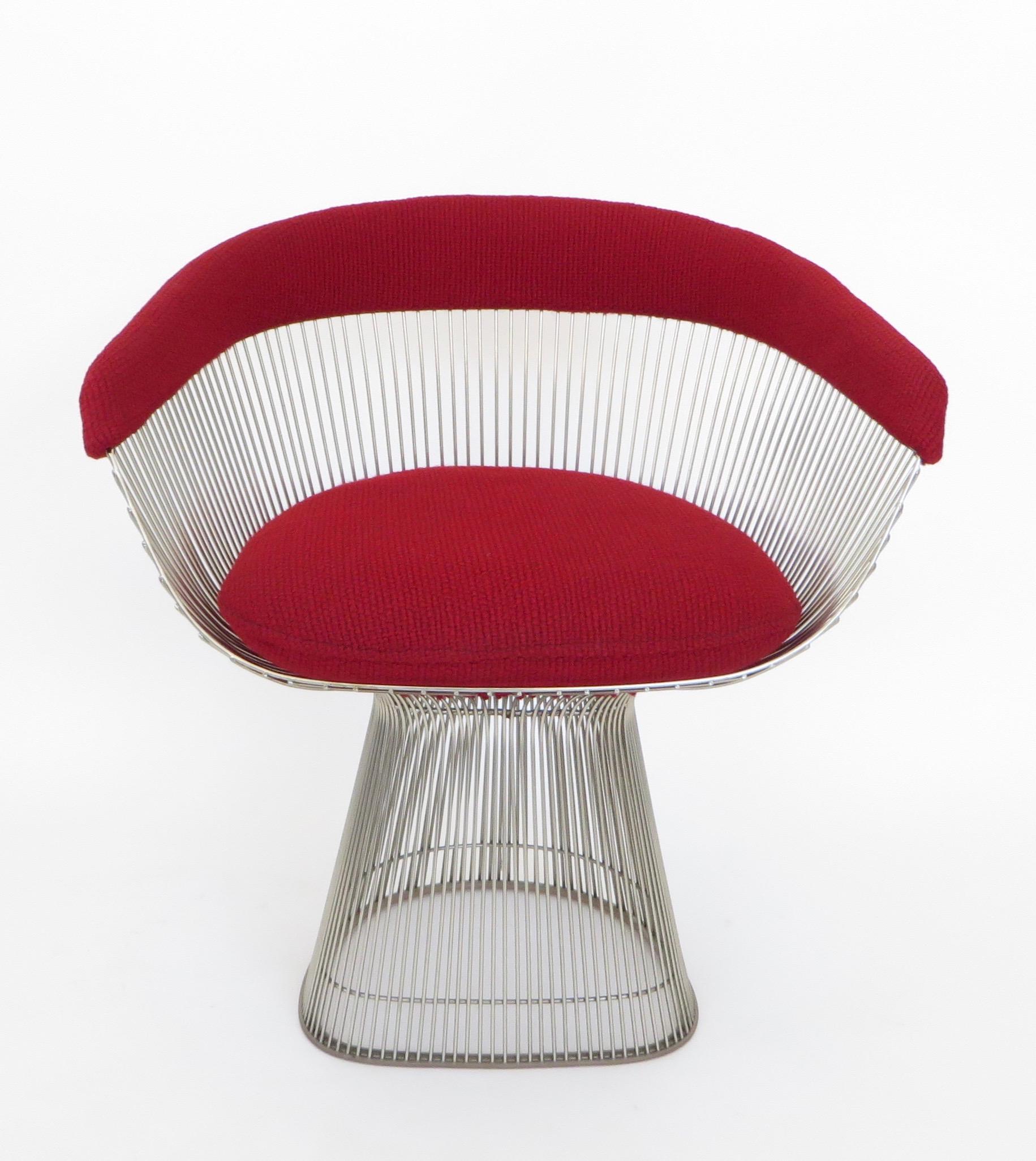 Four Warren Platner dining chairs for Knoll International, circa 1980.
These chairs have their original Knoll dark red bouclé fabric and original Knoll International tags.
The provenance of this set of four chairs is from the Morton Salt Executive