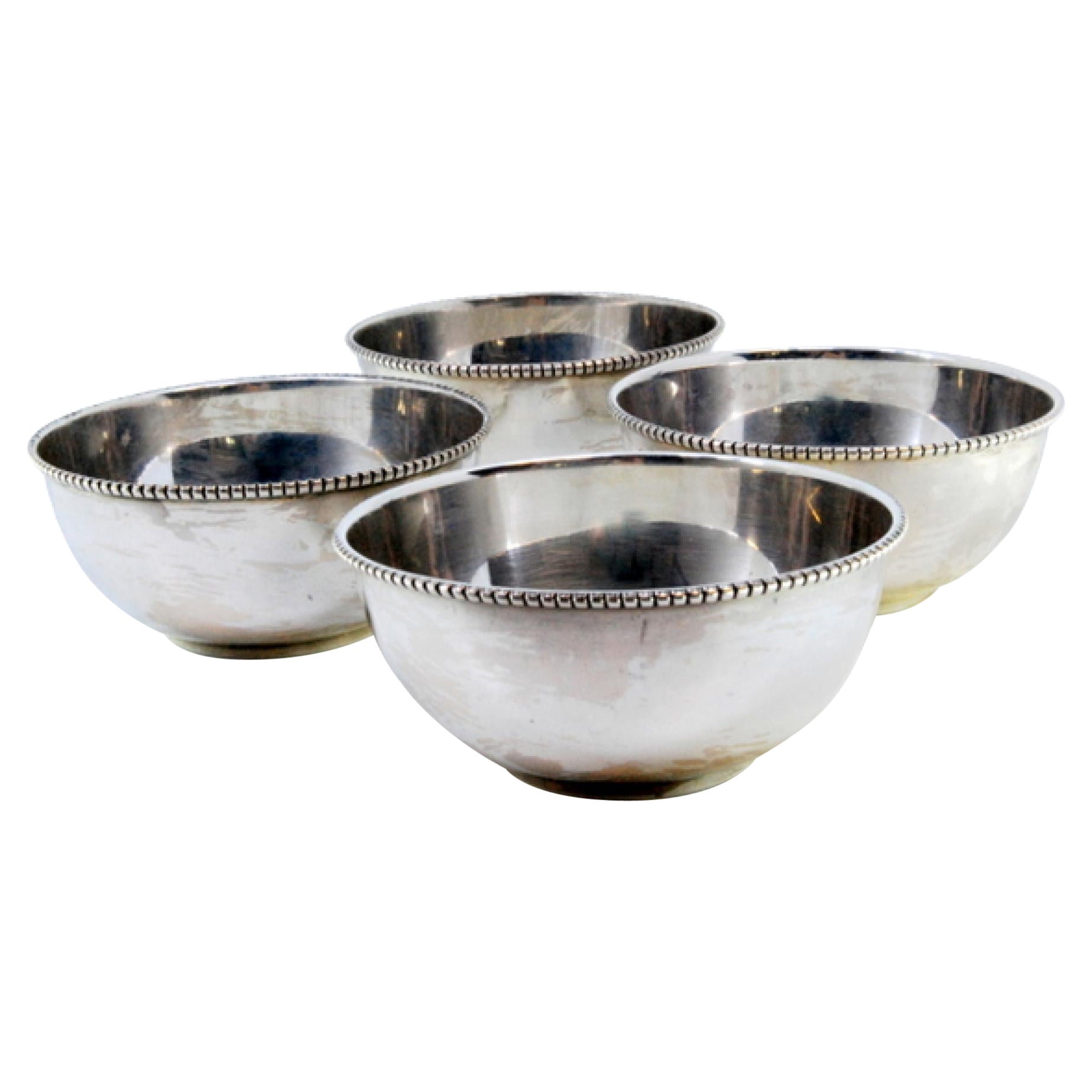 Set of four washbasins in smooth silver with pearly edges
