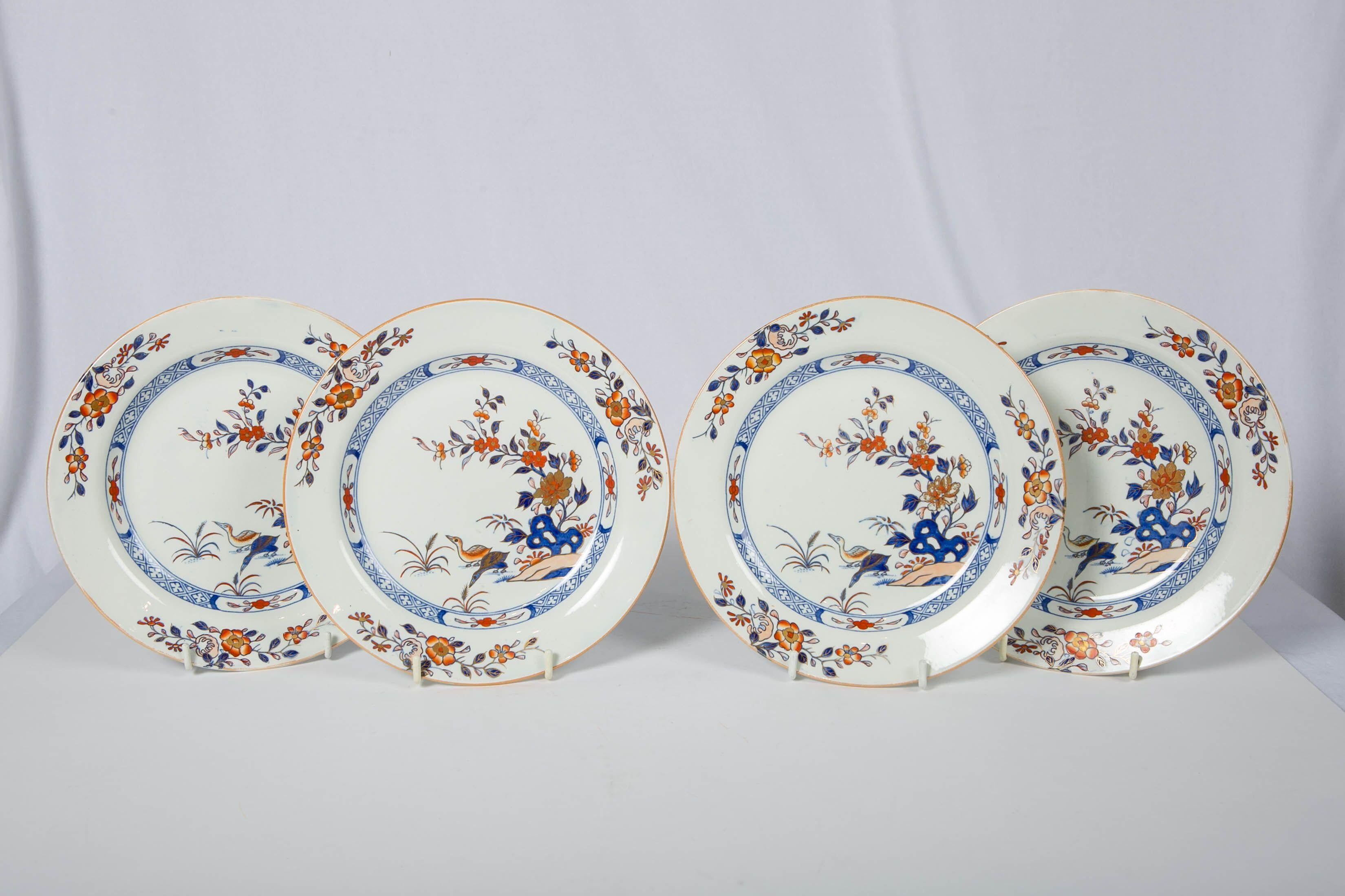 We are pleased to offer this set of four Wedgwood dessert dishes showing a simply beautiful scene with a pair of ducks by the water's edge. Nearby are a flowering fruit tree and rockwork painted in Imari colors of iron red, cobalt blue, and