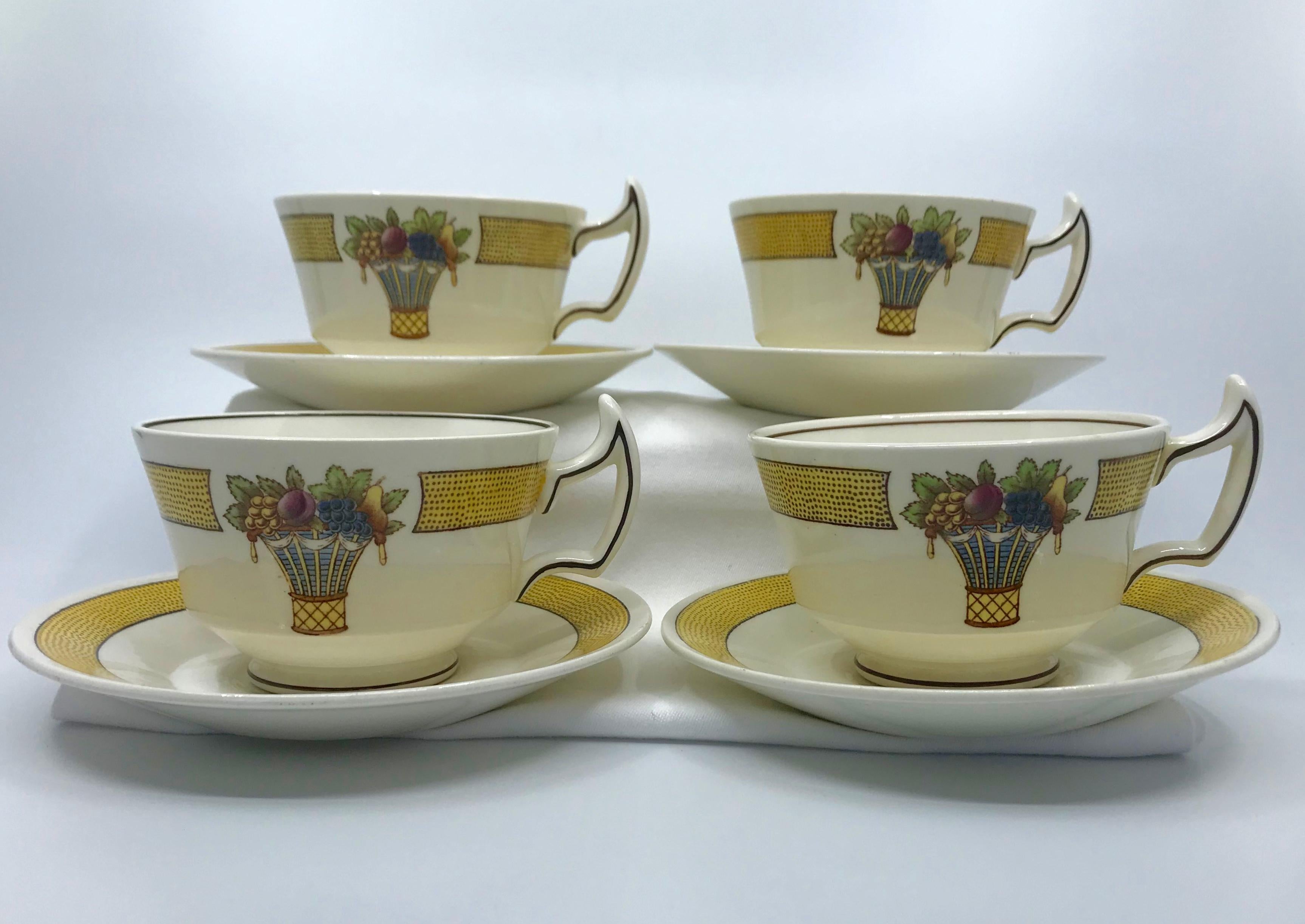 yellow coffee cups and saucers