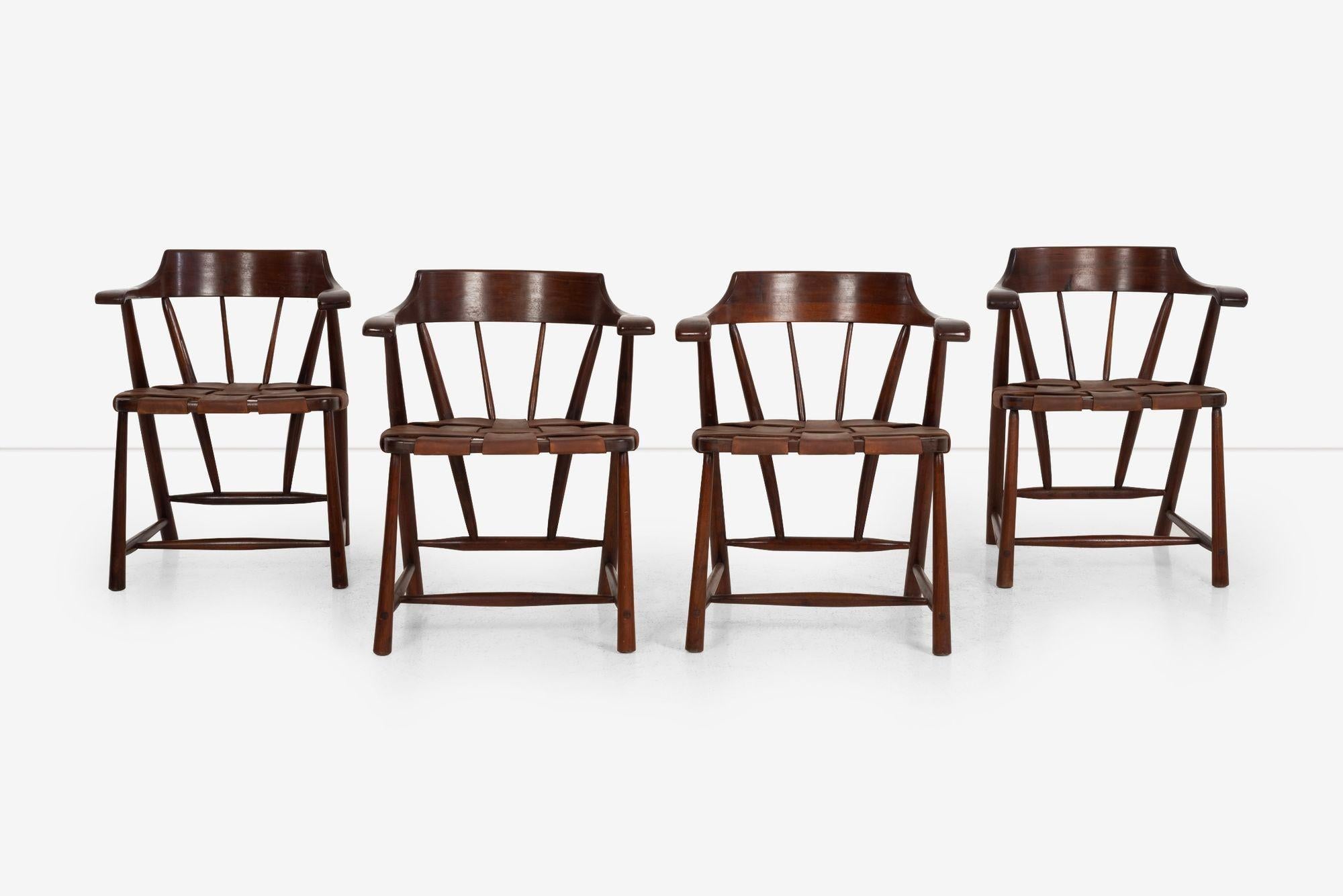 Set of Four Wharton Esherick Captain’s Chairs, 1955
A rare set of four handcrafted Captain’s chairs by Wharton Esherick, featuring sculpted walnut frames and newly replaced saddle leather straps with a rich patina.
Materials: Walnut, saddle