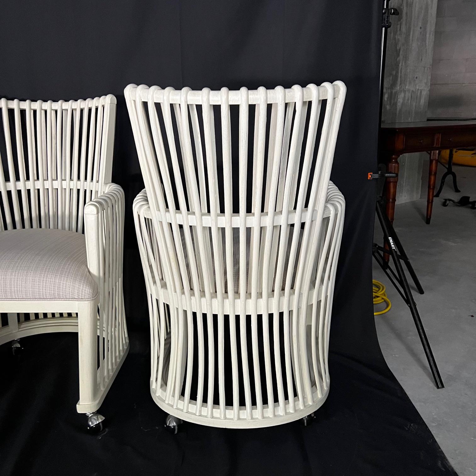 Contemporary Set of Four White Bent Rattan Dining or Club Chairs with Casters