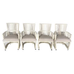 Set of Four White Bent Rattan Dining or Club Chairs with Casters