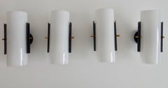 Set of Four White Plexiglass and Black Perforated Metal Wall Lamps