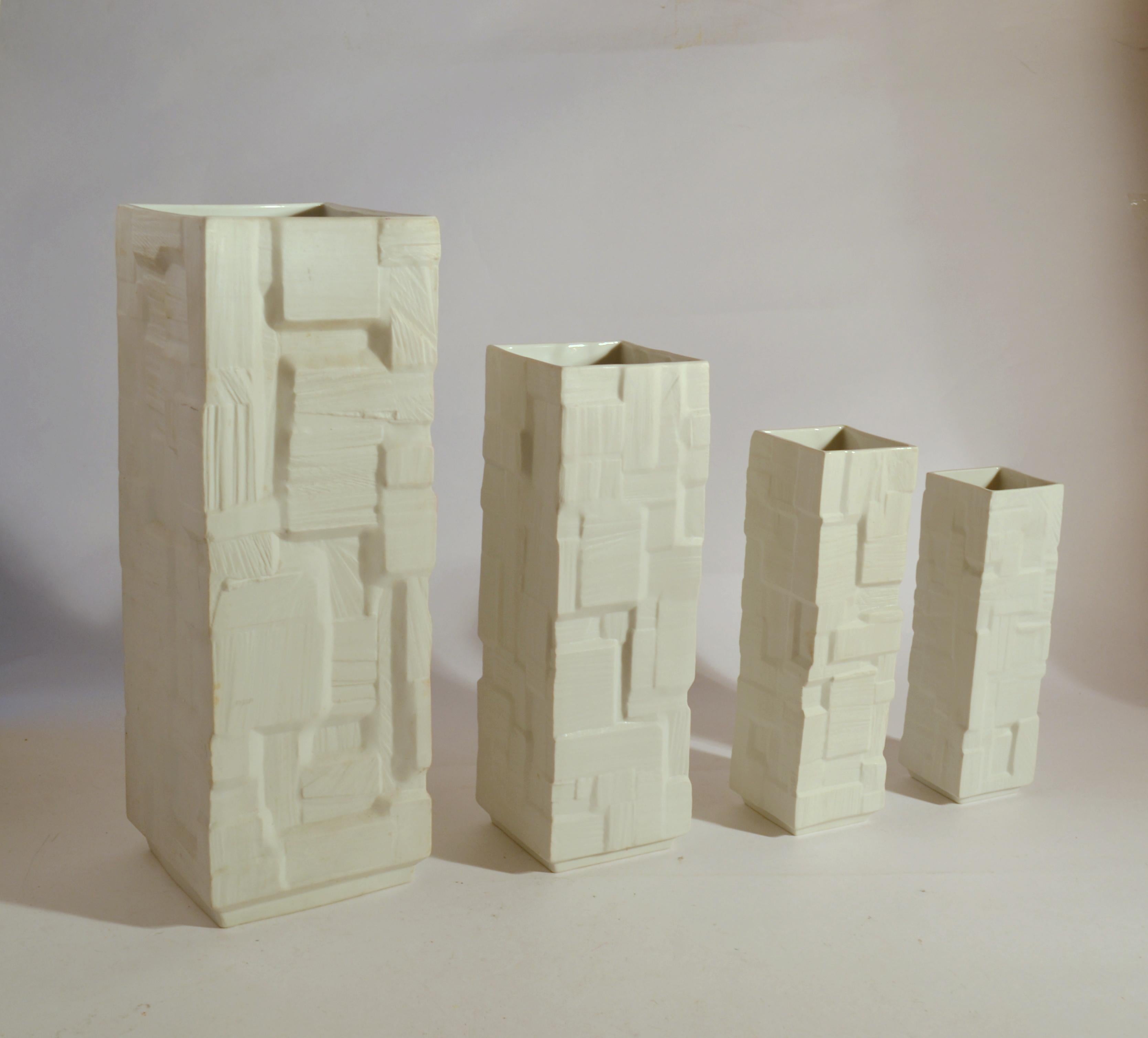Set of four white porcelain square vases in descending heights with relief surface, Germany, 1960's.
Measures: Heights 40-32-26-22.5 cm
Width 14-10-7.5-6.4 cm.