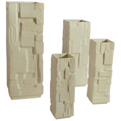 Set of Four White Square Relief Vases