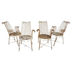 Used set of four white  steel armchairs "Cap d'Ail" by Mathieu Matégot, ca 1950 