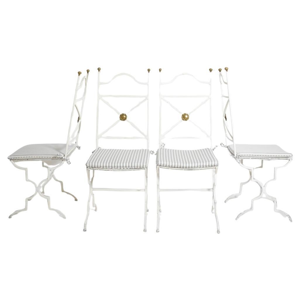Set of four white wrought iron chairs, 1940s