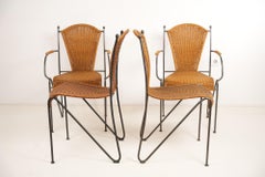 Set of Four Wicker and Iron Chair By Frederic Weinberg 1950s