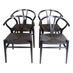 Set di quattro sedie Wishbone modello CH24 in nero di Hans J. Wegner