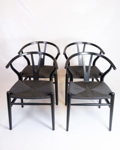Ensemble de quatre chaises Wishbone Model No. CH24 en noir par Hans J. Wegner
