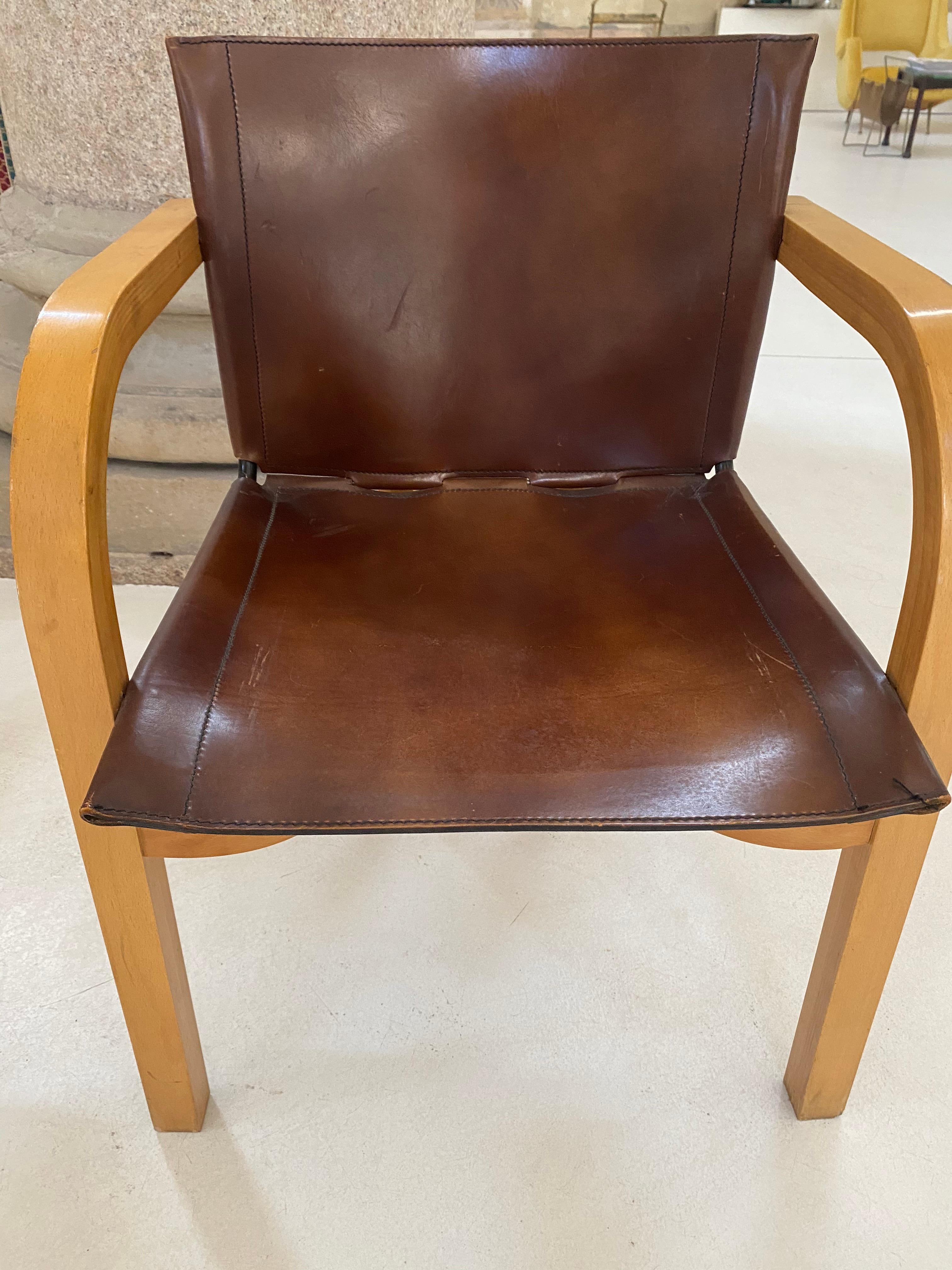 Set of Four Wood and Leather Chairs 12