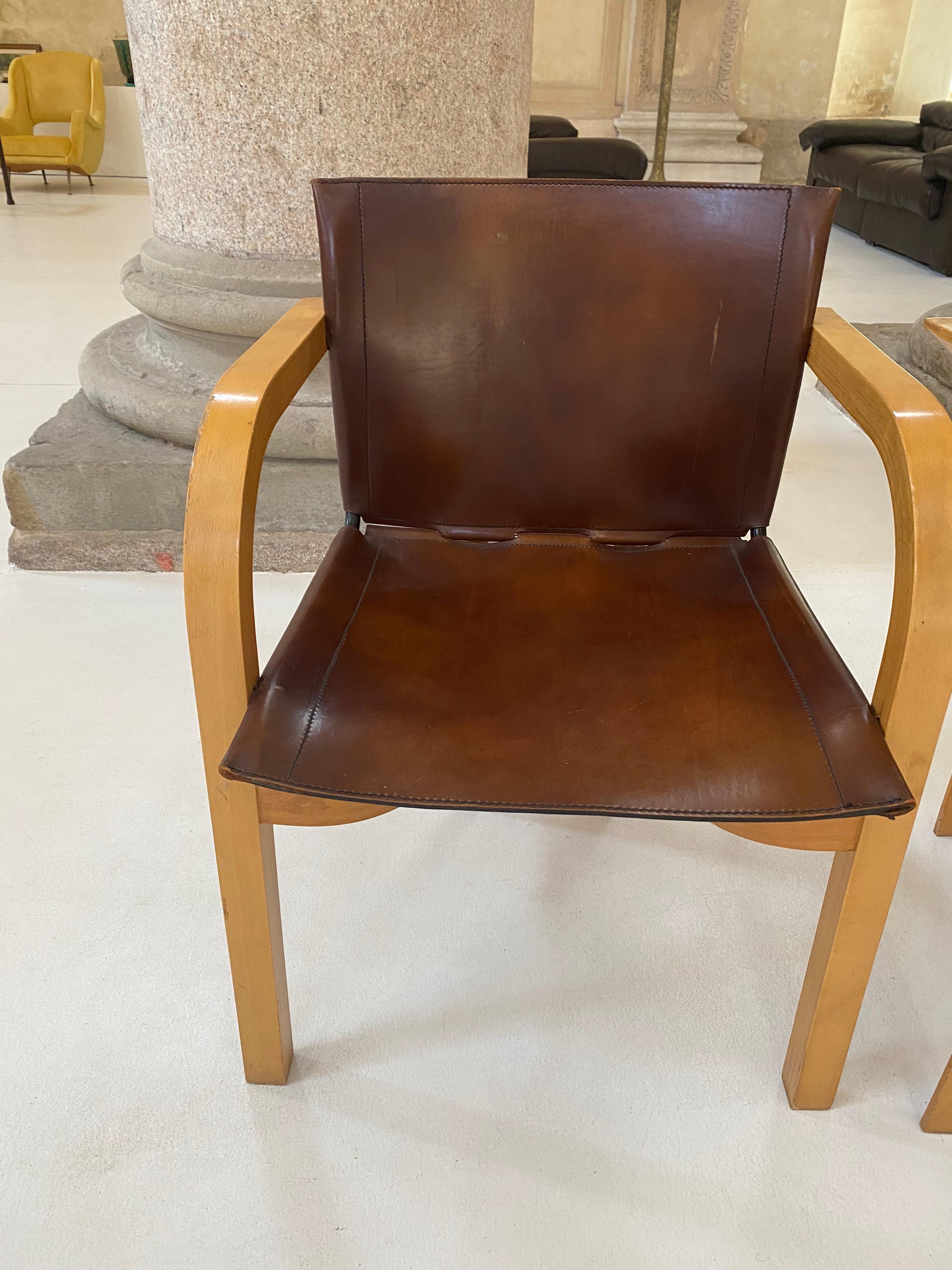 Set of Four Wood and Leather Chairs 14
