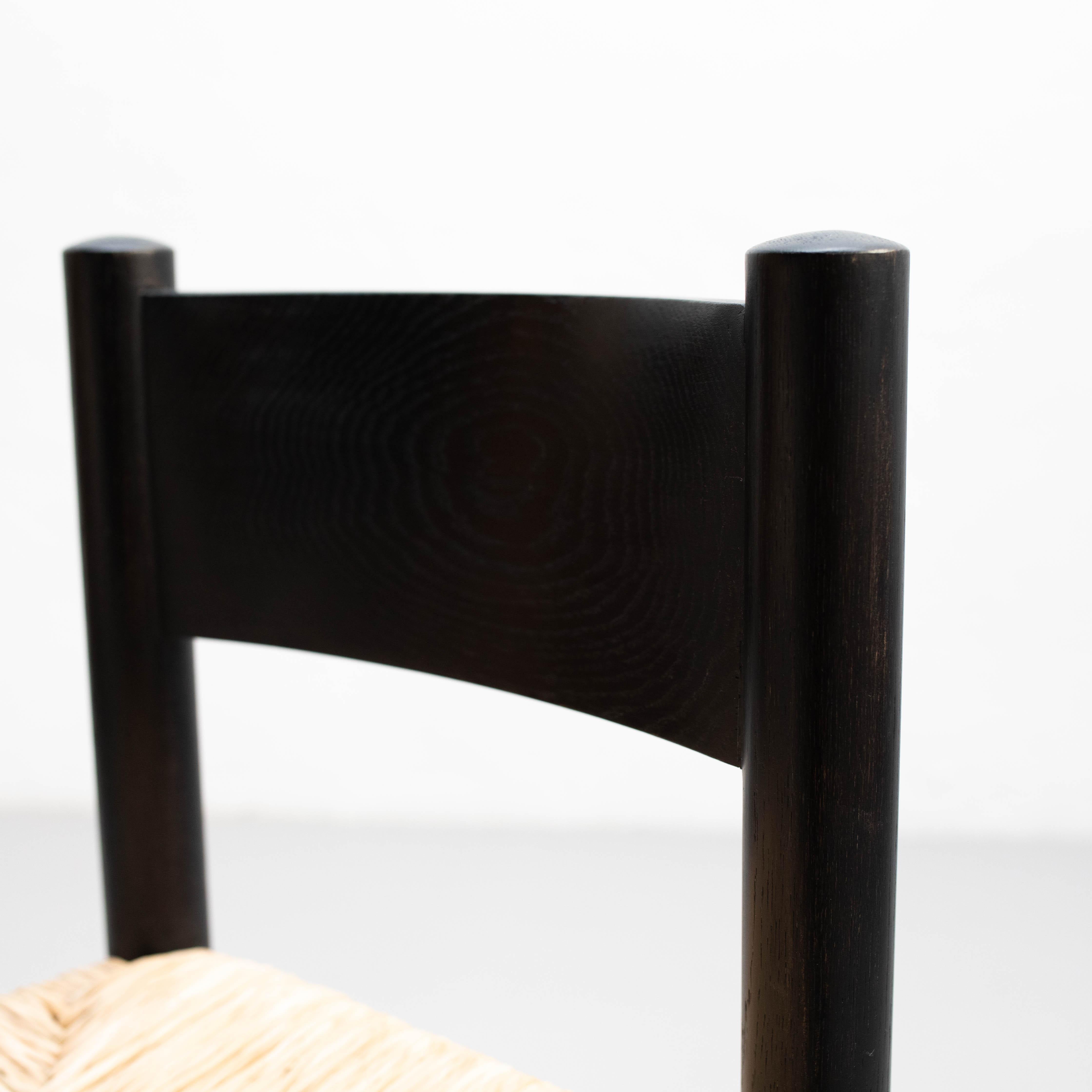 Ensemble de quatre chaises en bois et rotin d'après Charlotte Perriand - Circa 1980 en vente 1