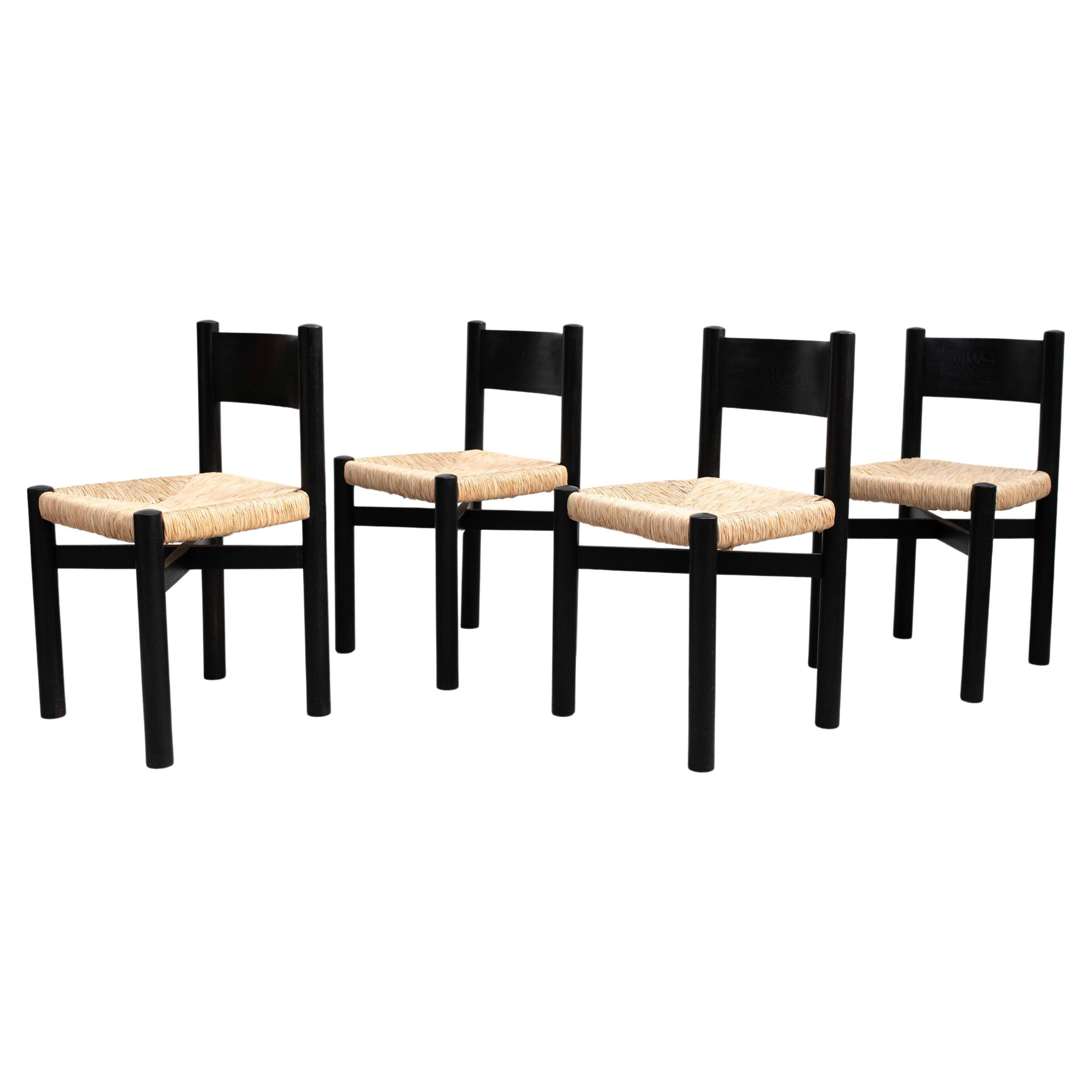 Set of Four Wood and Rattan Chairs after Charlotte Perriand, circa 1980 For Sale