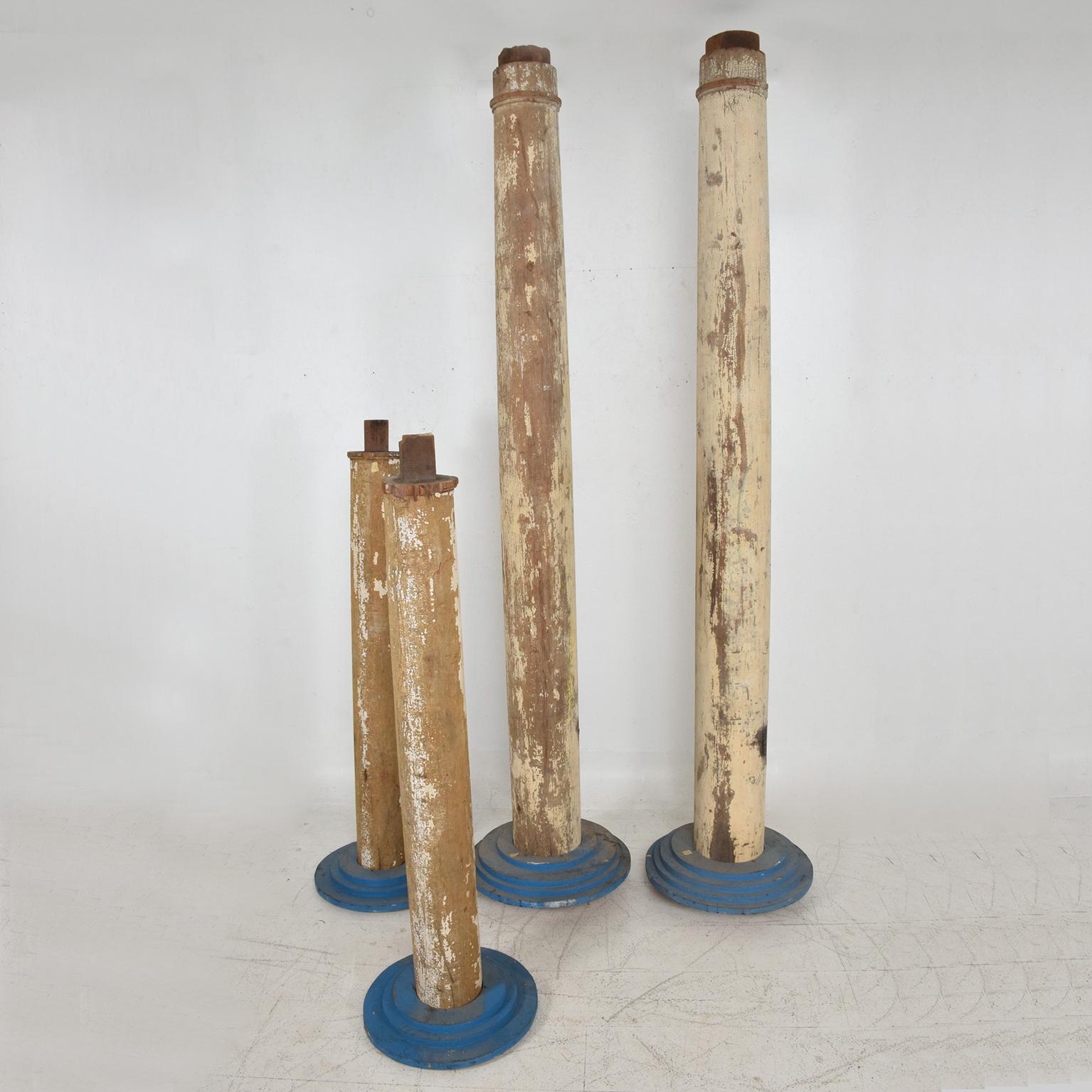 For your consideration a set of four architectural wood columns. 
Original paint and patina. 
Dimensions: 
Tall: 88 1/2