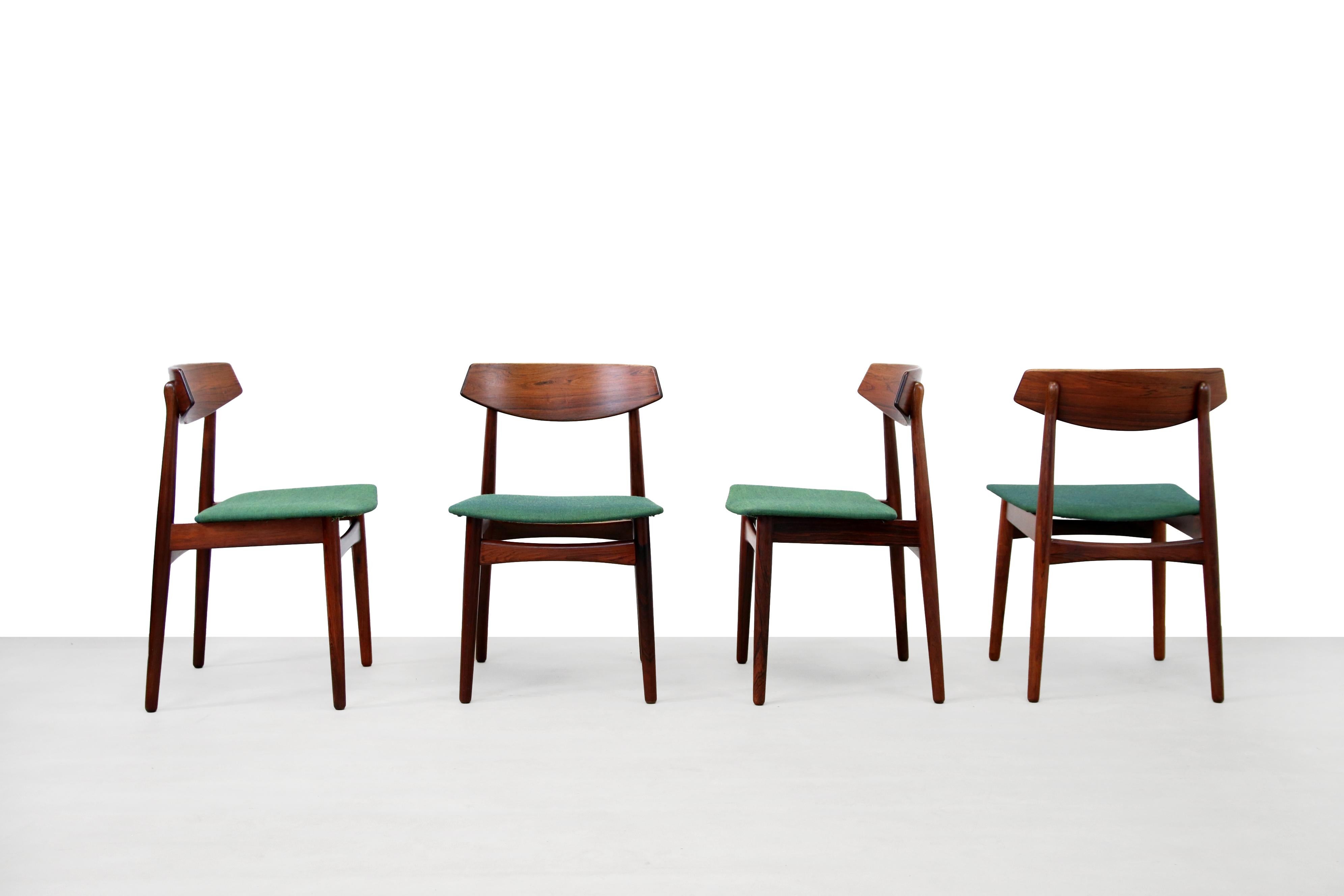 A very nice set of four vintage Danish design chairs, produced by Skovby Mobler. This set has been reupholstered in a green square remix 3 (color 982) by Kvadrat, which colors beautifully with the dark tropical hard wood. The craftsmanship is