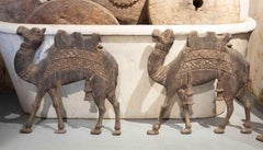 Set of Four Wooden Reliefs of Hand-Carved Camels