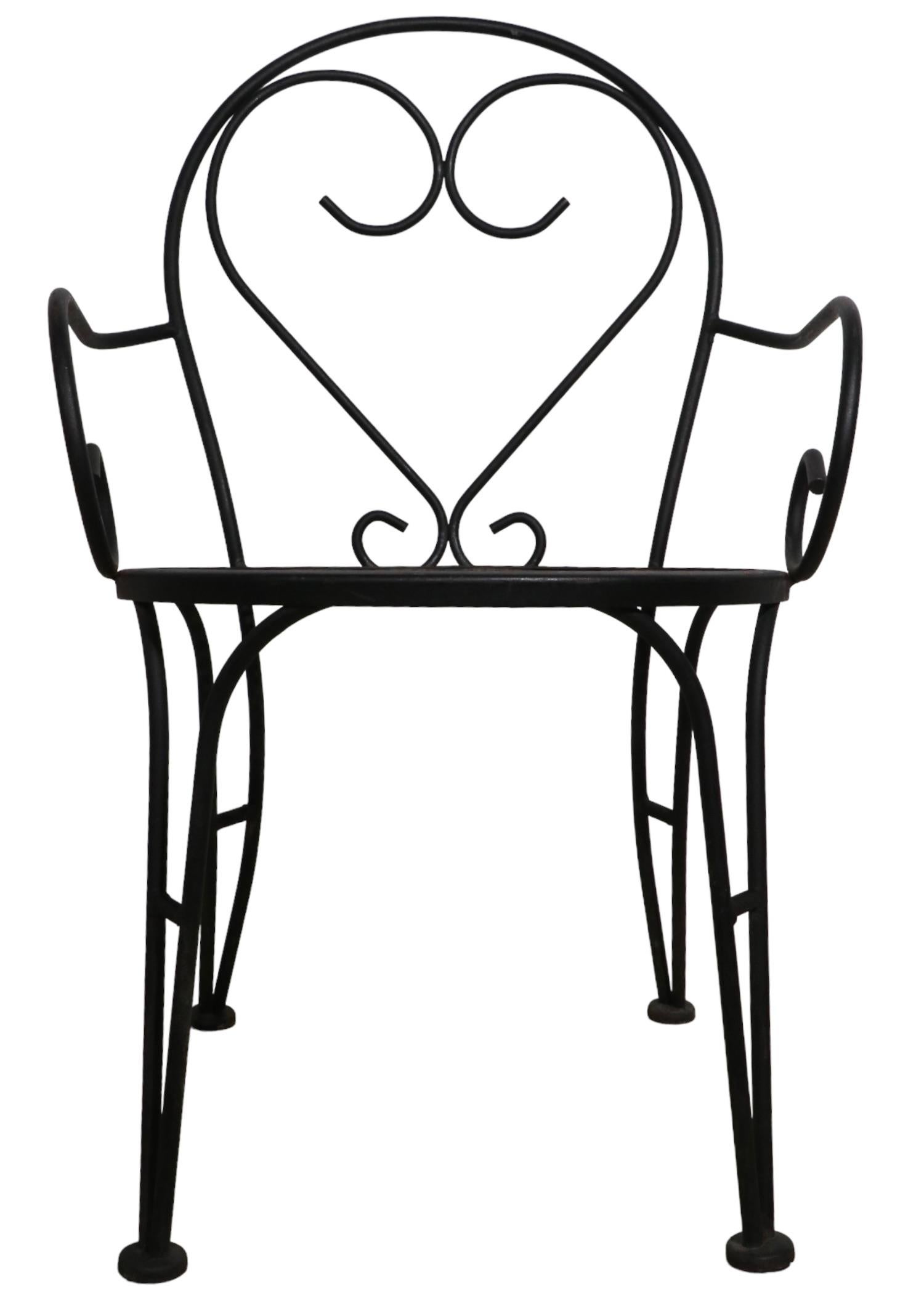 Set of Four Wrought Iron French Bistro Style Cafe Garden Patio Chairs In Good Condition In New York, NY