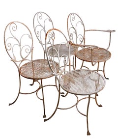 Lot de quatre chaises de jardin en fer forgé pour la terrasse ou le bord de piscine, attribuées à Salterini