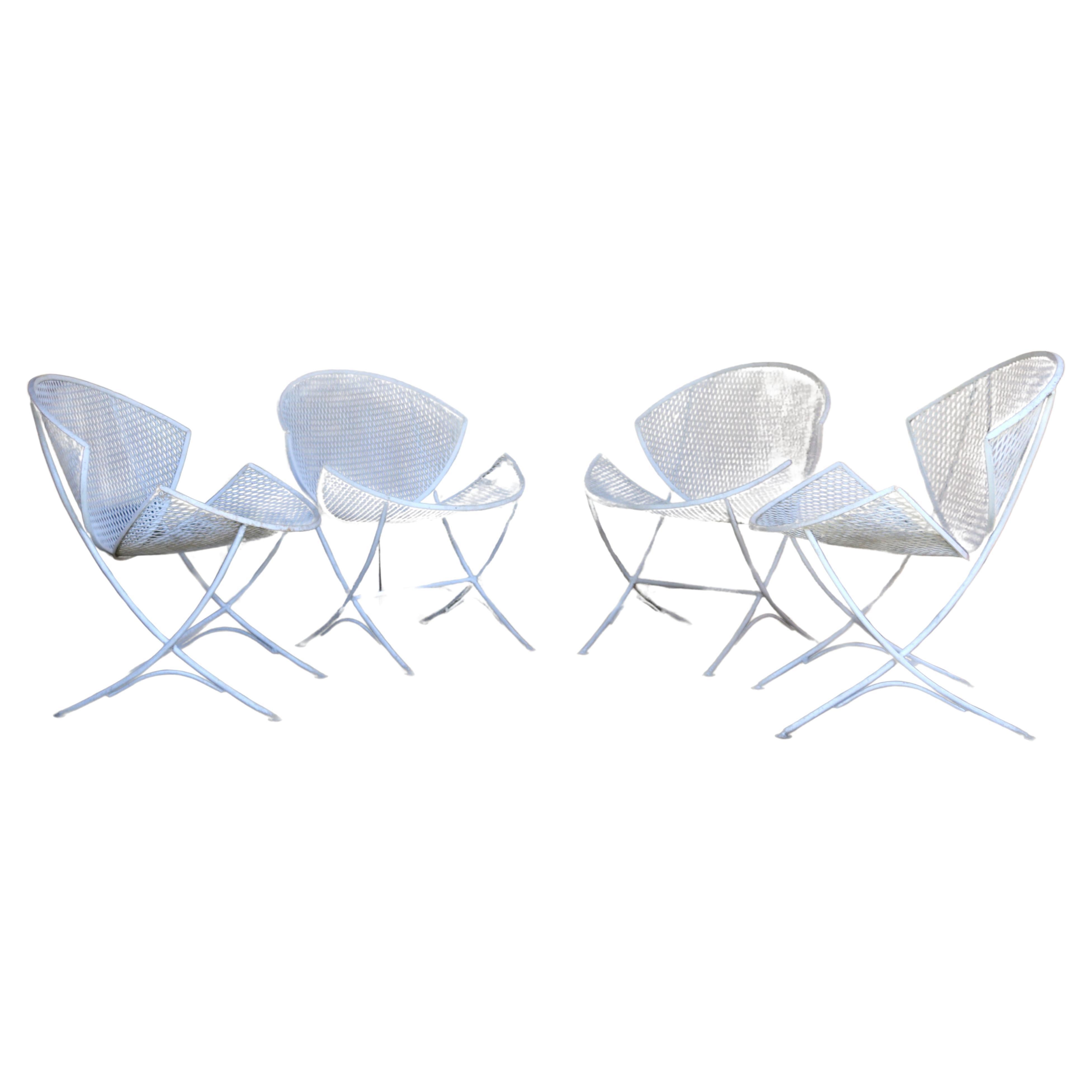 Stunning set of four Mid Century Orange Slice Patio Chair, also known as a Clamshell Chair, designed by Maurizio Tempestini for the John B. Salterini Company, ( they have no maker’s mark). This wonderful set is a classic example of Mid-Century
