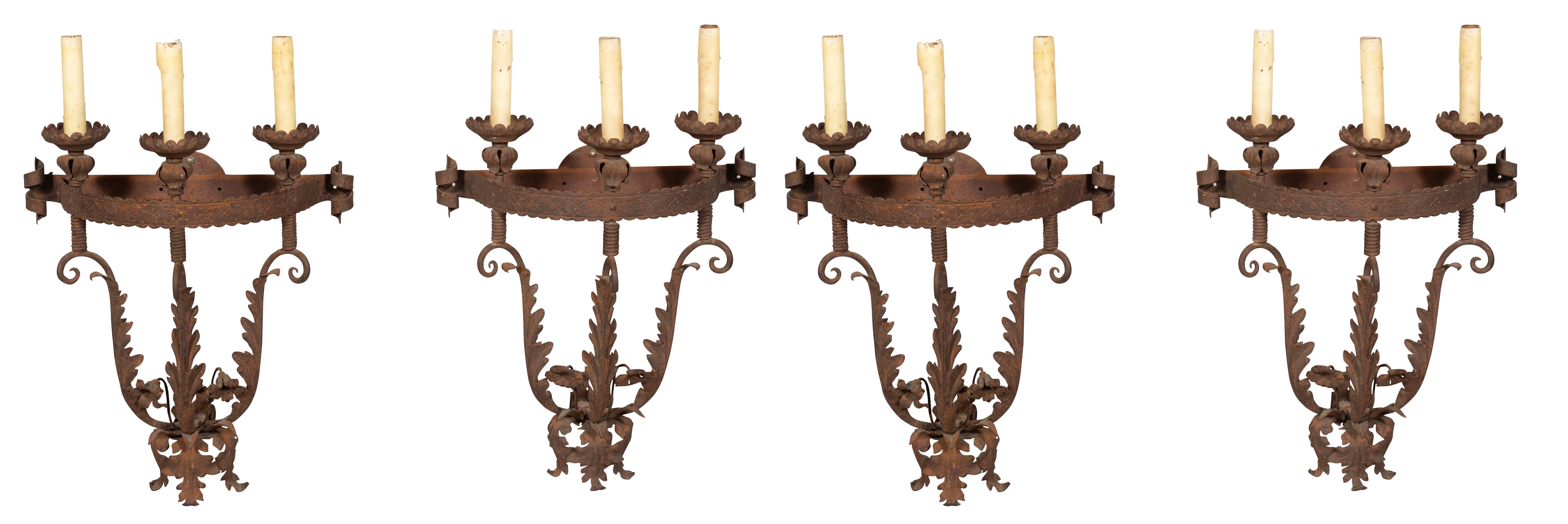 By repute remover from a Mizner house in Palm Beach. Three arm with acanthus leaf decoration.
