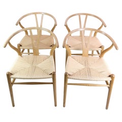 Ensemble de quatre chaises Y, modèle Ch24, conçues par Hans J. Wegner en chêne 