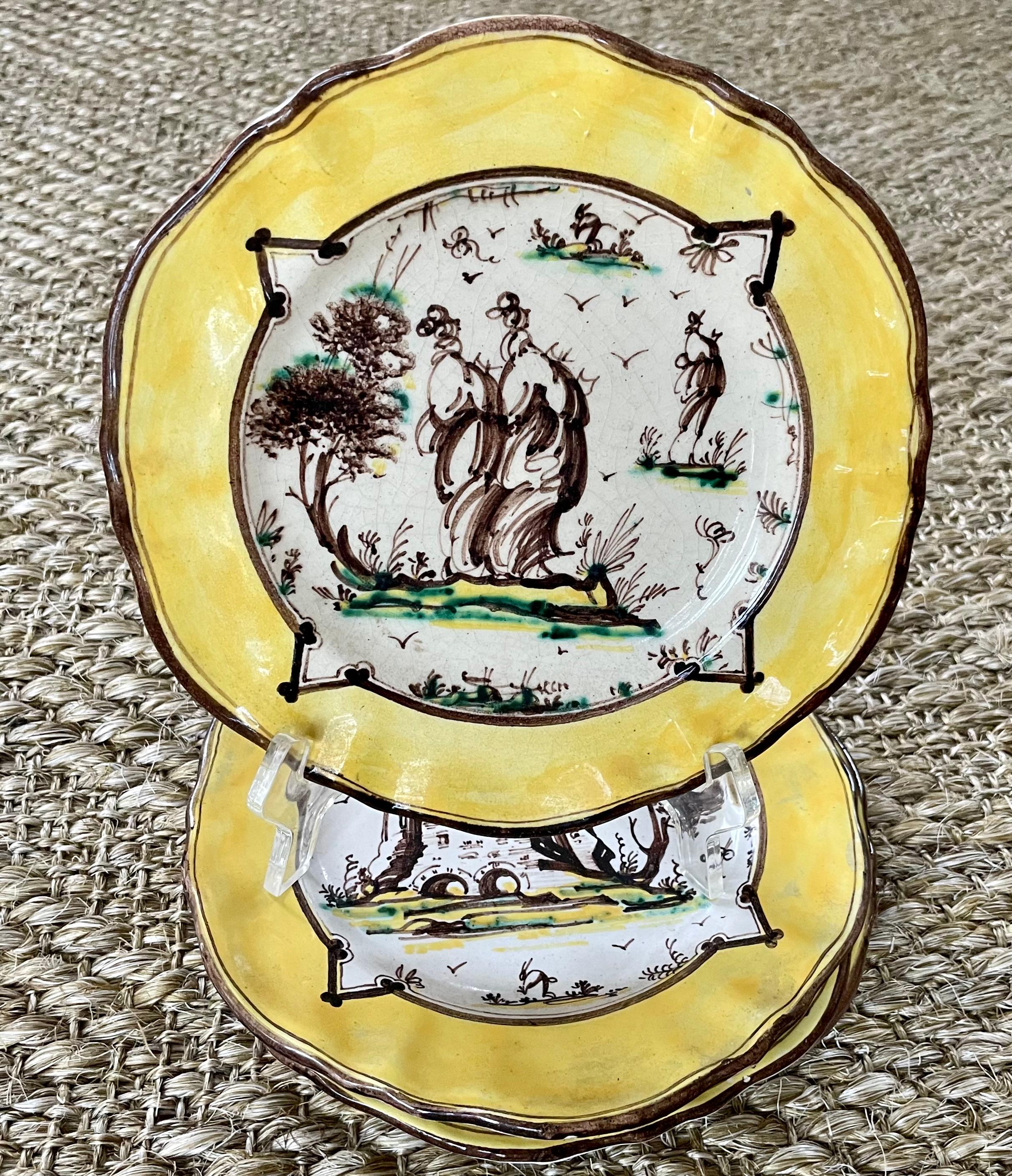 Set of Yellow Albisola Plates. Set of four charming Italian plates in characteristic yellow, green and brown with provincial castles, landscapes, figures and birds. With markings for Albisola. Italy early 19th century.

Dimensions: 8.25