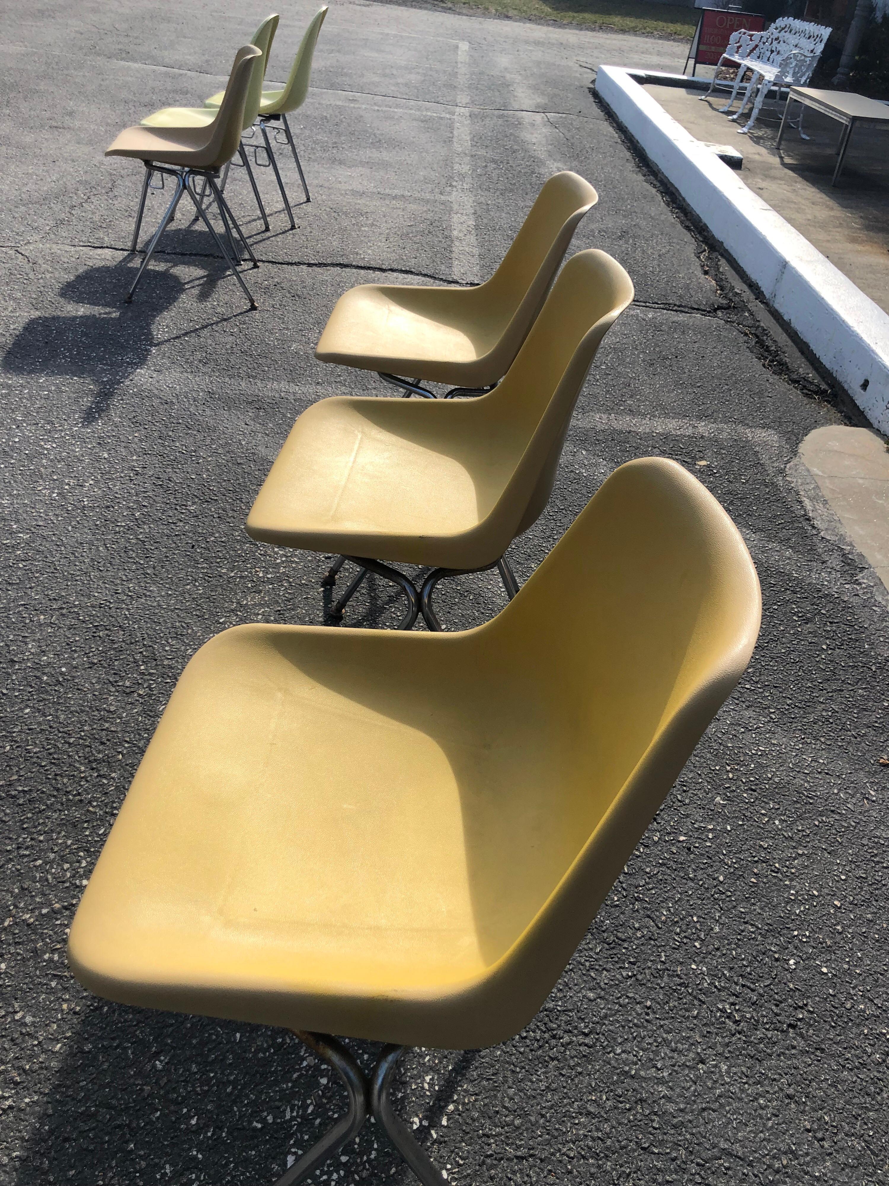 Metal Set of Three Yellow Jon Stewart Stackable Shell Chairs