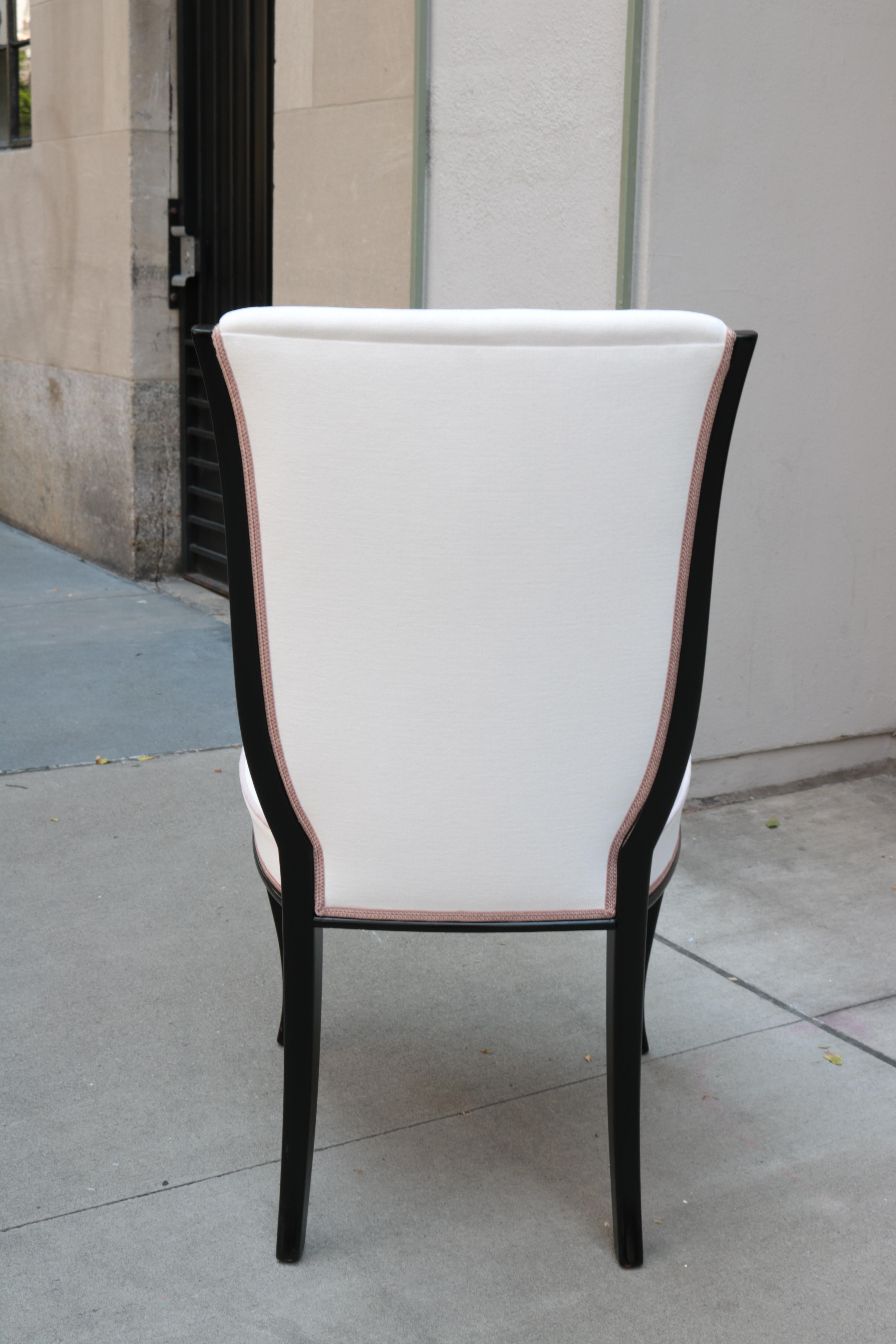 A Set of Fourteen Dining Chairs 2