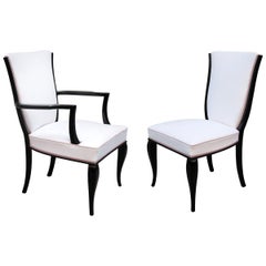 A Set of Fourteen Dining Chairs