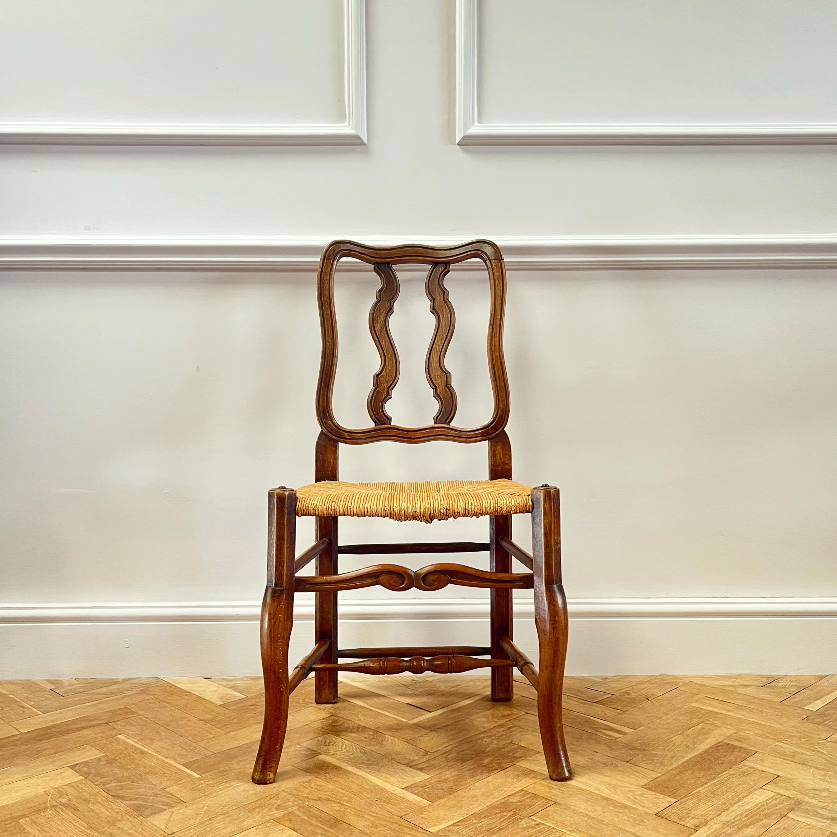 Rush Set of Fourteen Early Twentieth Century French Vernacular Dining Chairs For Sale