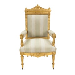 Set of Fourteen French 19th Century Louis XVI St. Giltwood Dining Chairs