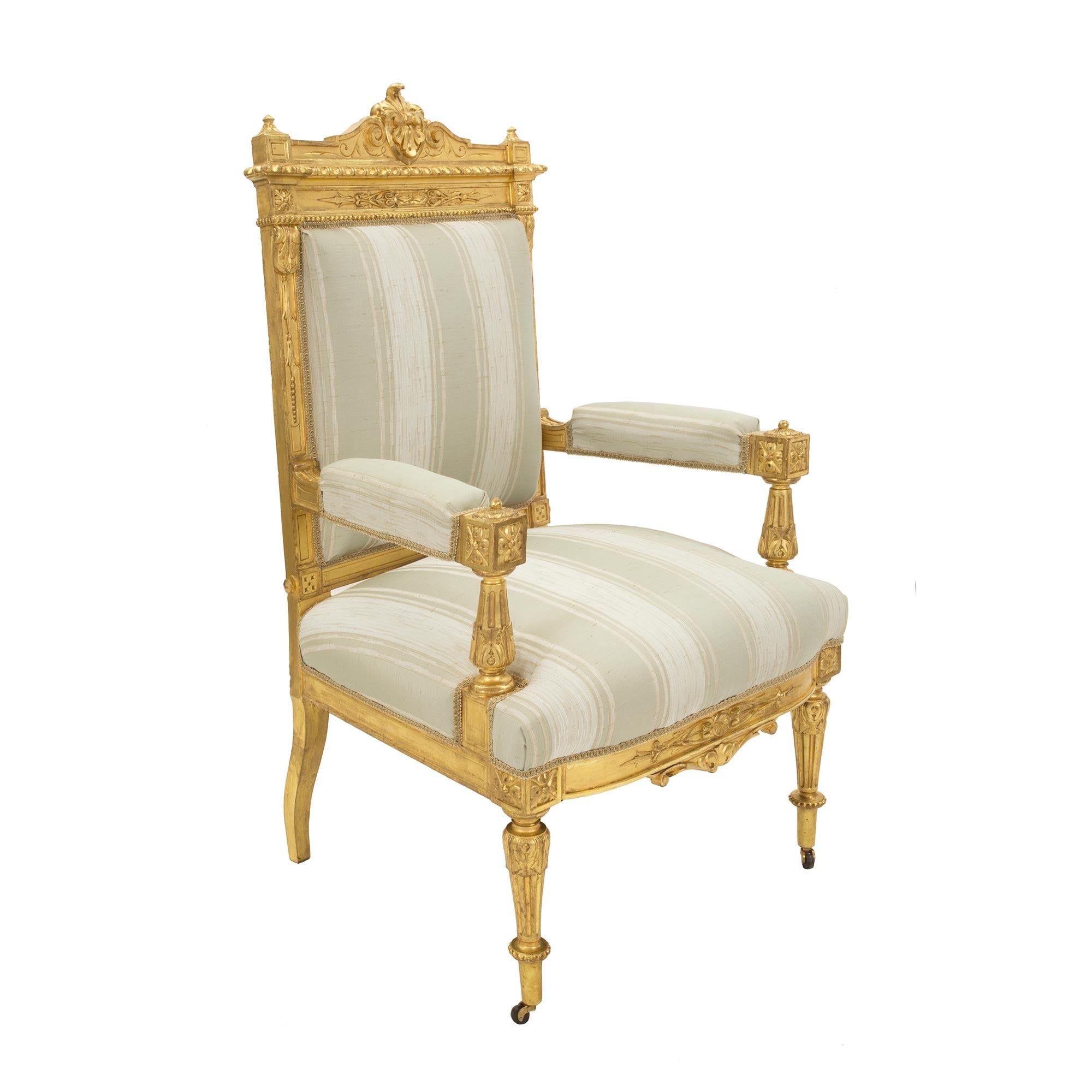Set of Fourteen French 19th Century Louis XVI St. Giltwood Dining Chairs In Good Condition For Sale In West Palm Beach, FL