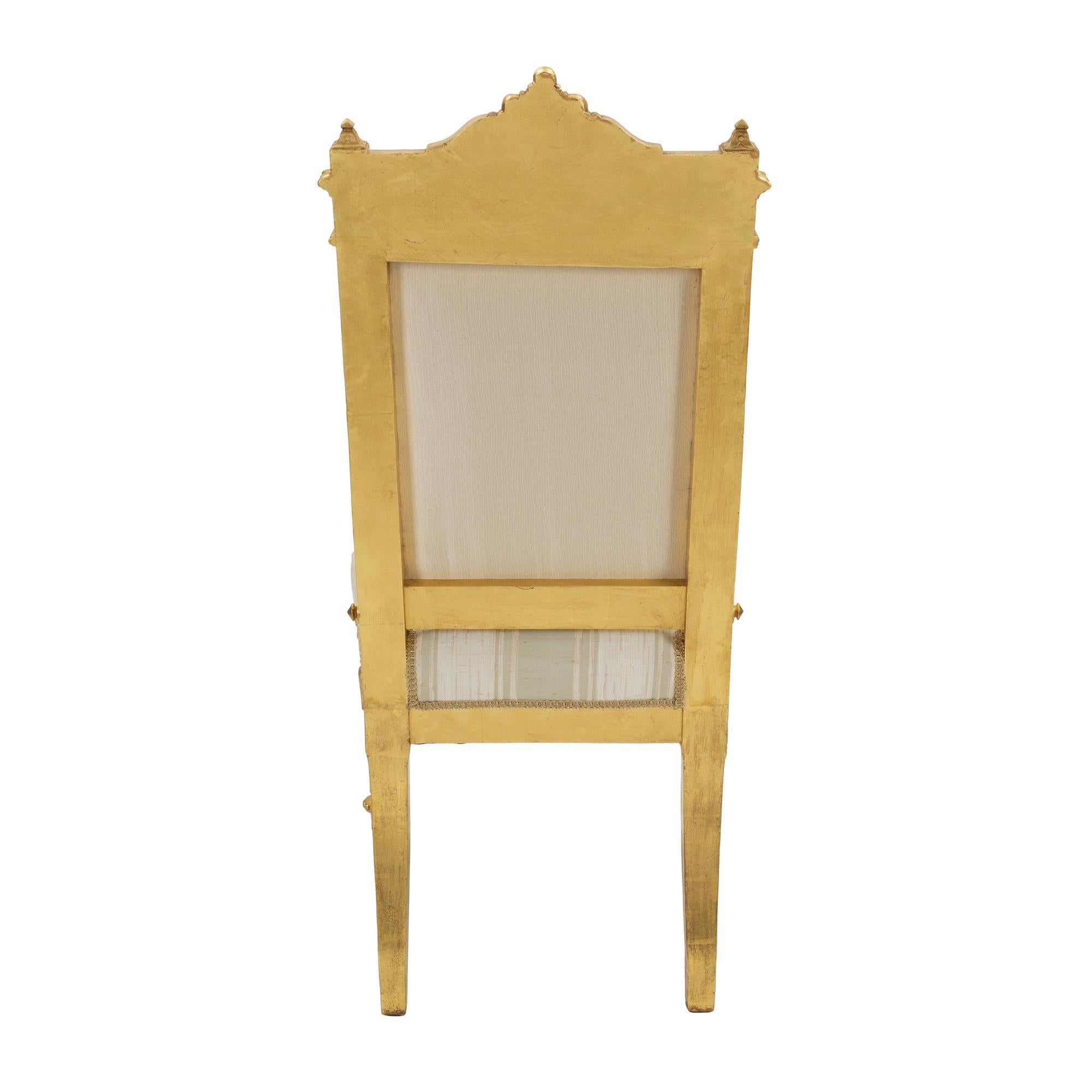 Set of Fourteen French 19th Century Louis XVI St. Giltwood Dining Chairs For Sale 5