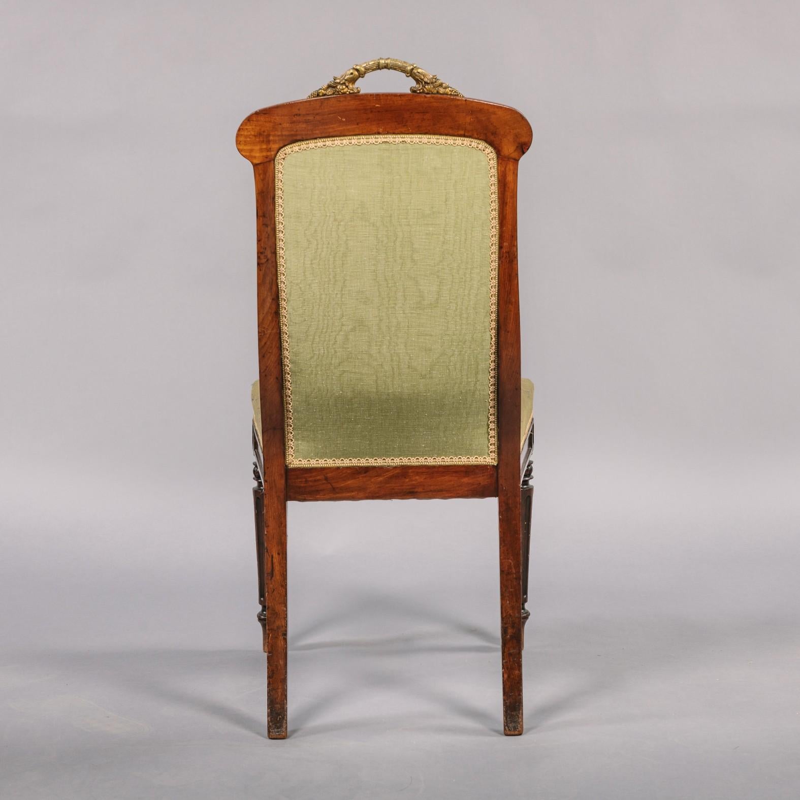 French Set of Fourteen Gilt-Bronze Mounted Mahogany Dining Chairs For Sale