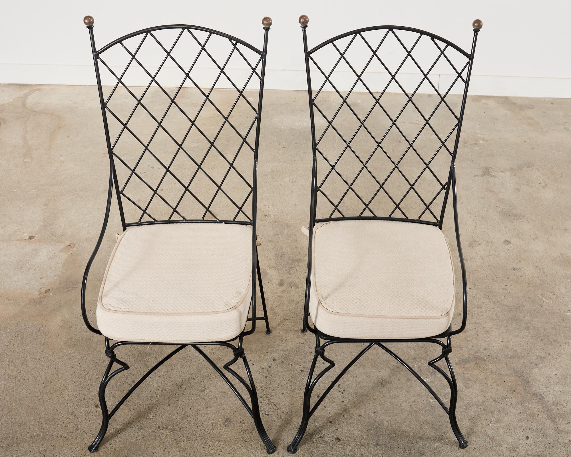 Set of Fourteen Maison Royere Style Iron Garden Dining Chairs  In Good Condition For Sale In Rio Vista, CA