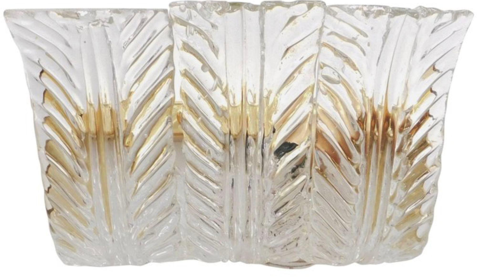 One of a kind set of fourteen Italian sconces/wall lights with three original vintage clear Murano glass leaves with textured details on brass frames / Designed by Maria Maggi / Made in Italy, 1990's.
Width: 10.5 inches / Height: 6.5 inches / Depth: