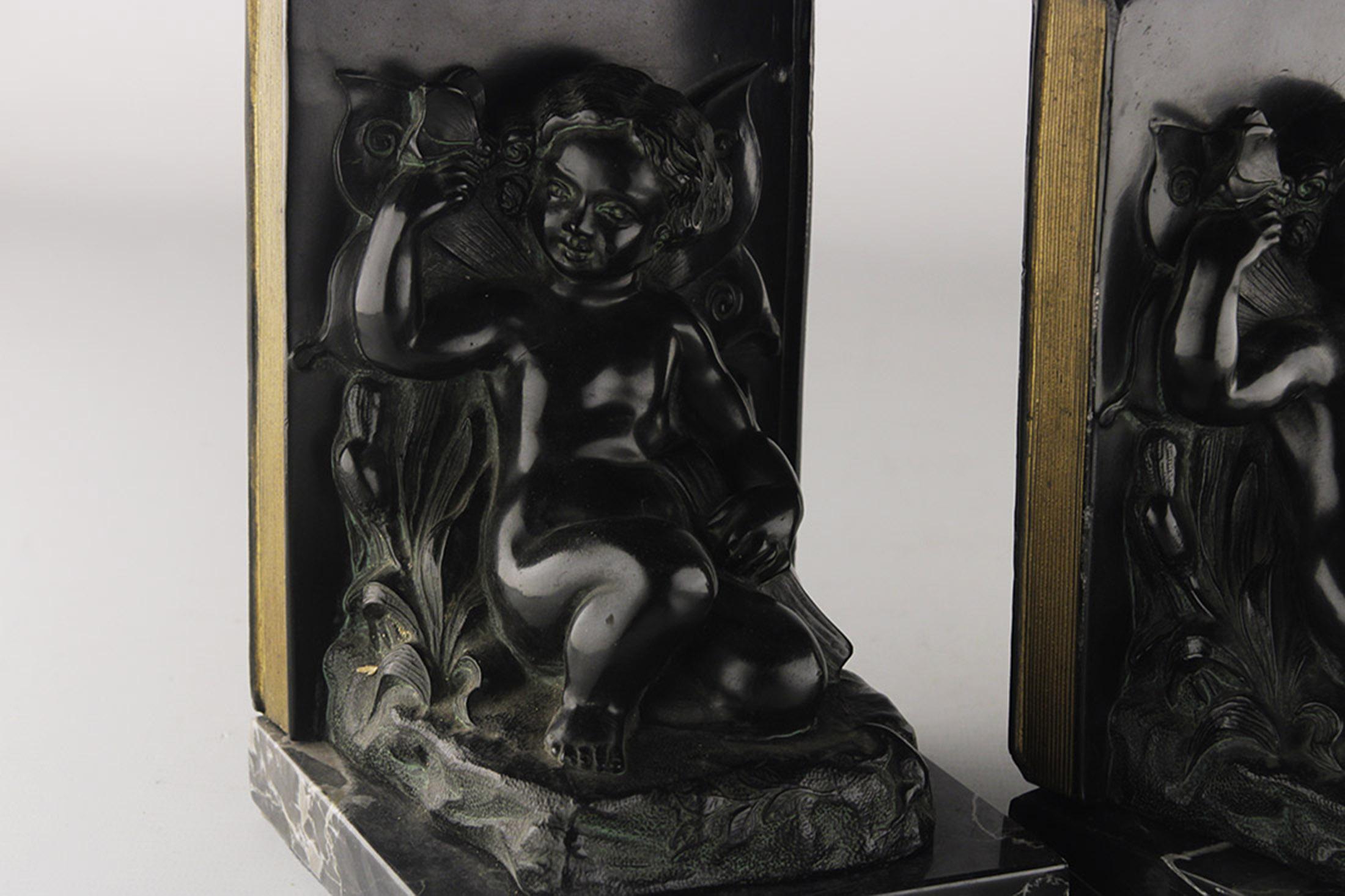 Art Deco Set of French Art Déco Zamac Winged Cherub/Fairy Child Bookends with Marble Base For Sale