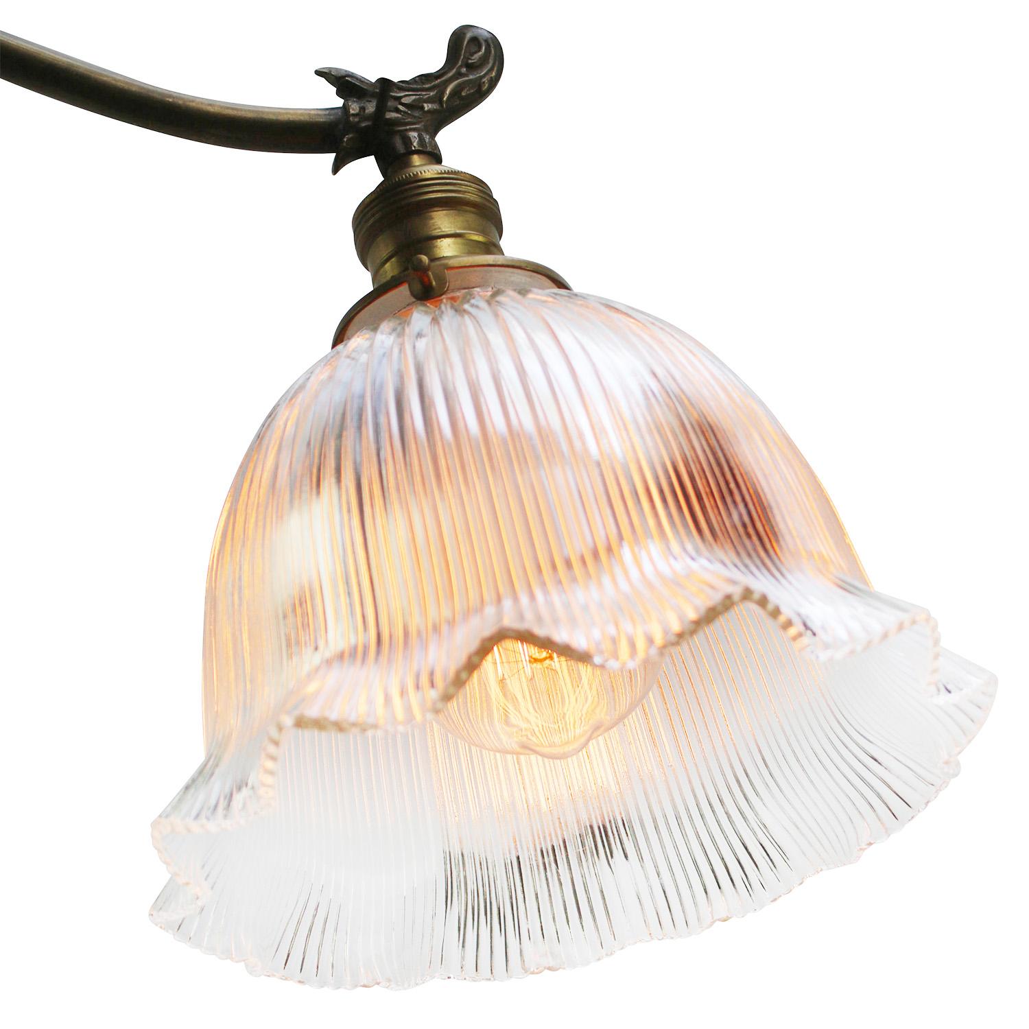 French wall lamp
Holophane clear glass shade
Brass wall piece and arm

diameter brass wall mount: 10 cm / 3.94”

Weight: 1.30 kg / 2.9 lb

Priced per individual item. All lamps have been made suitable by international standards for incandescent