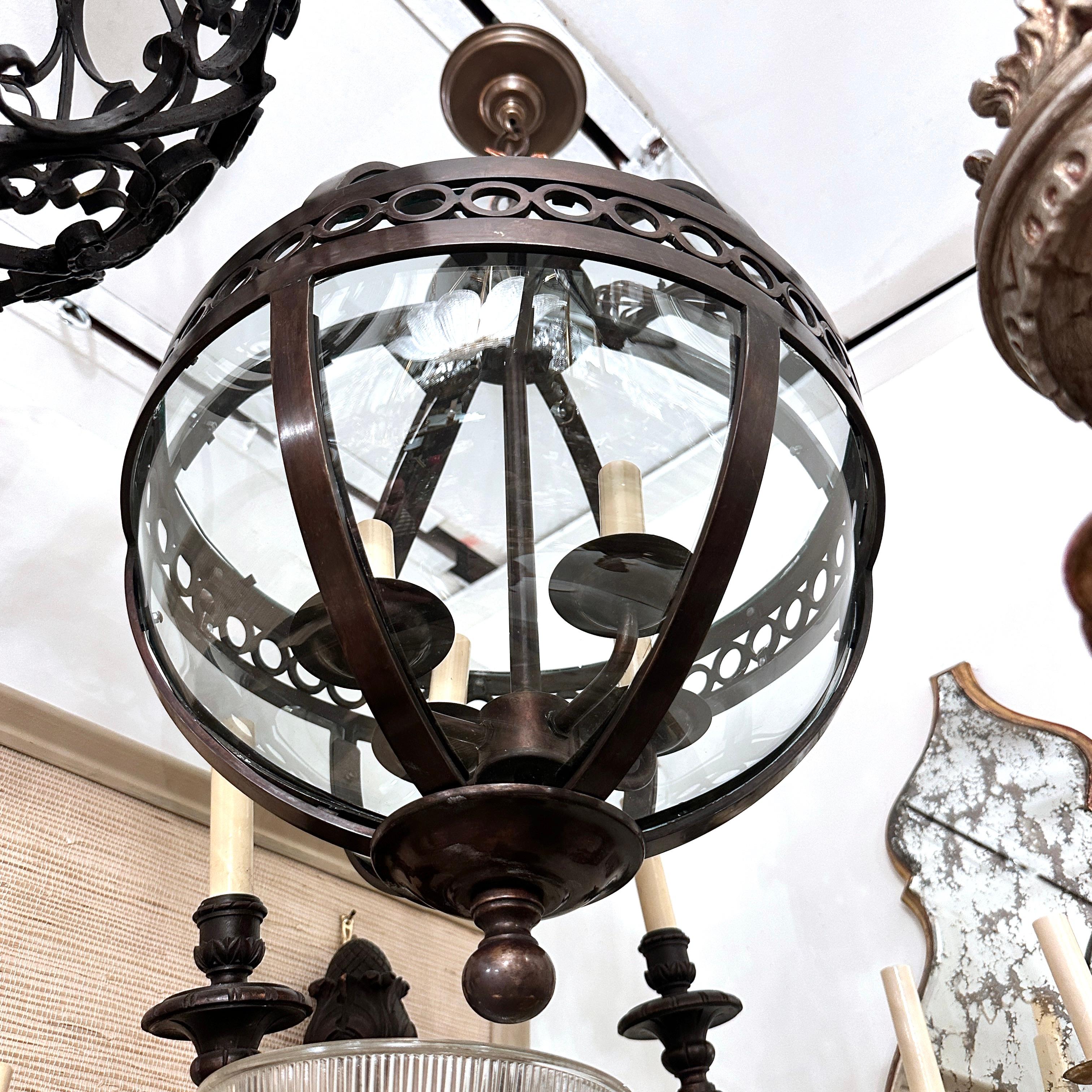 A set of circa 1950’s French bronze lanterns with 6 interior lights. Sold individually.

Measurements:
Current drop: 30
