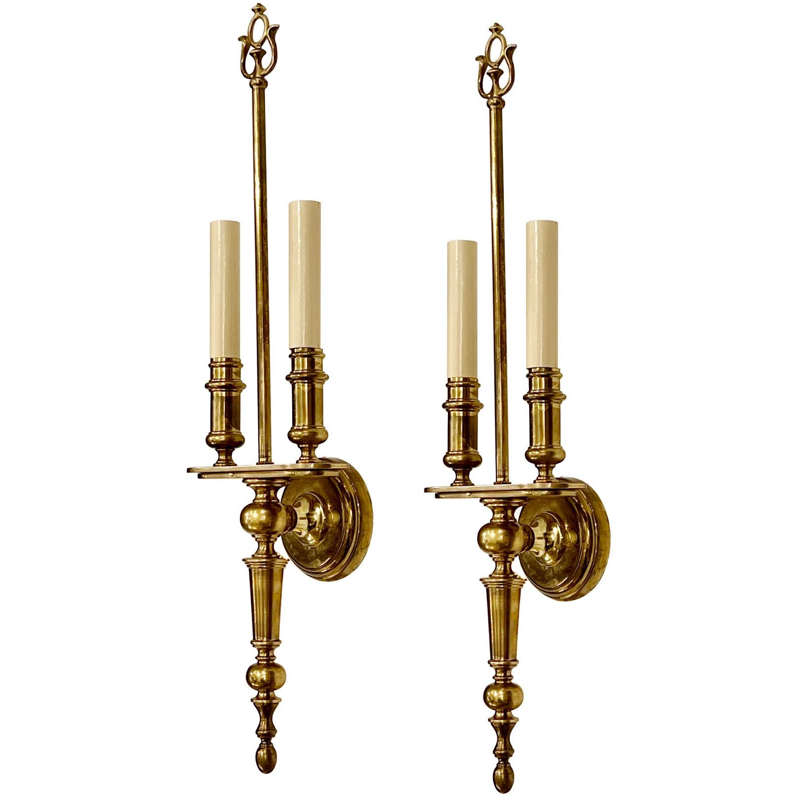 Set of eight circa 1940's French patinated bronze two-arm sconces. Sold in pairs.

Measurements:
Height: 22