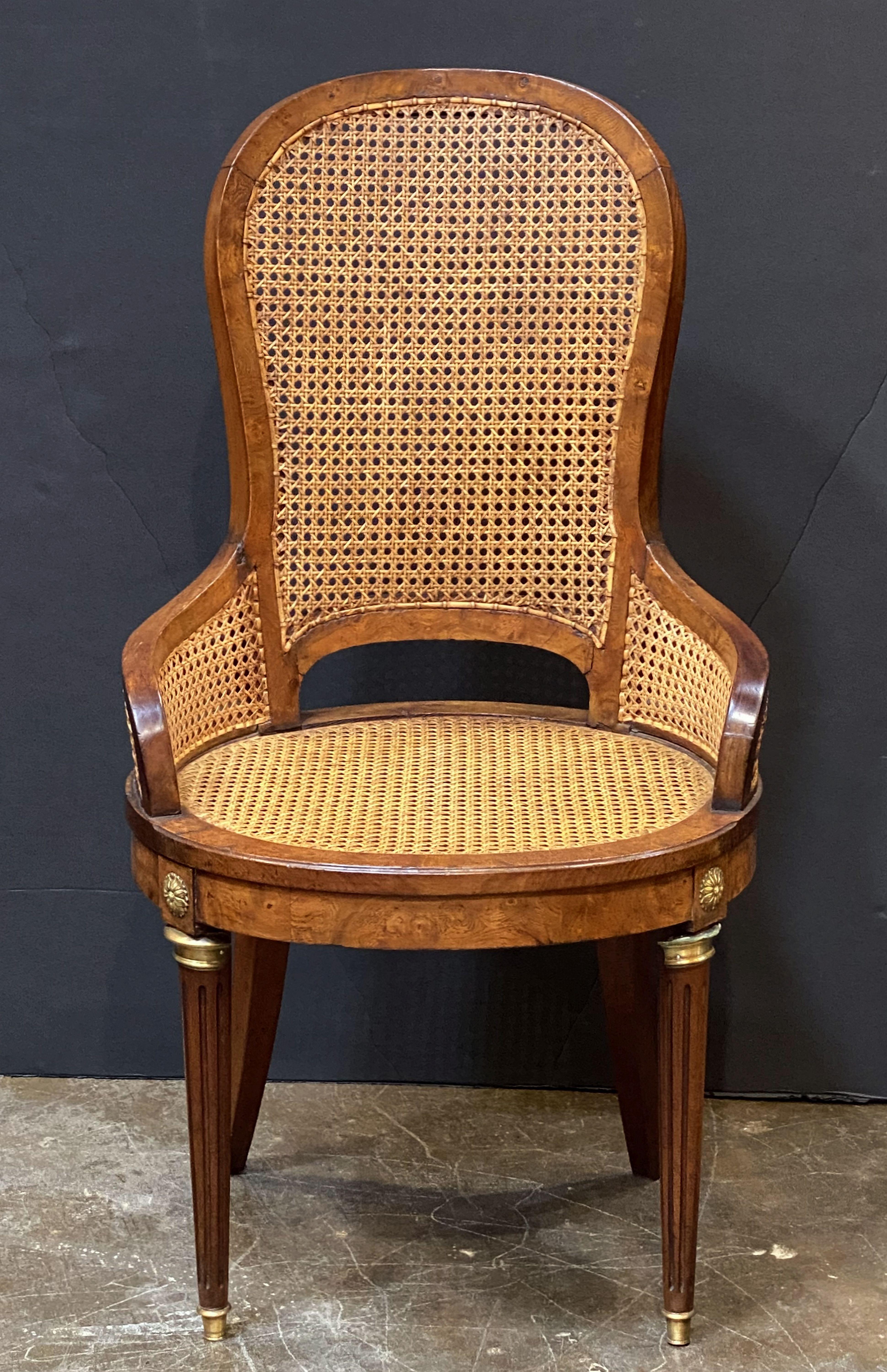 19th Century Set of French Caned Walnut Bergère Dining Chairs, Two Arms and Four Side Chairs