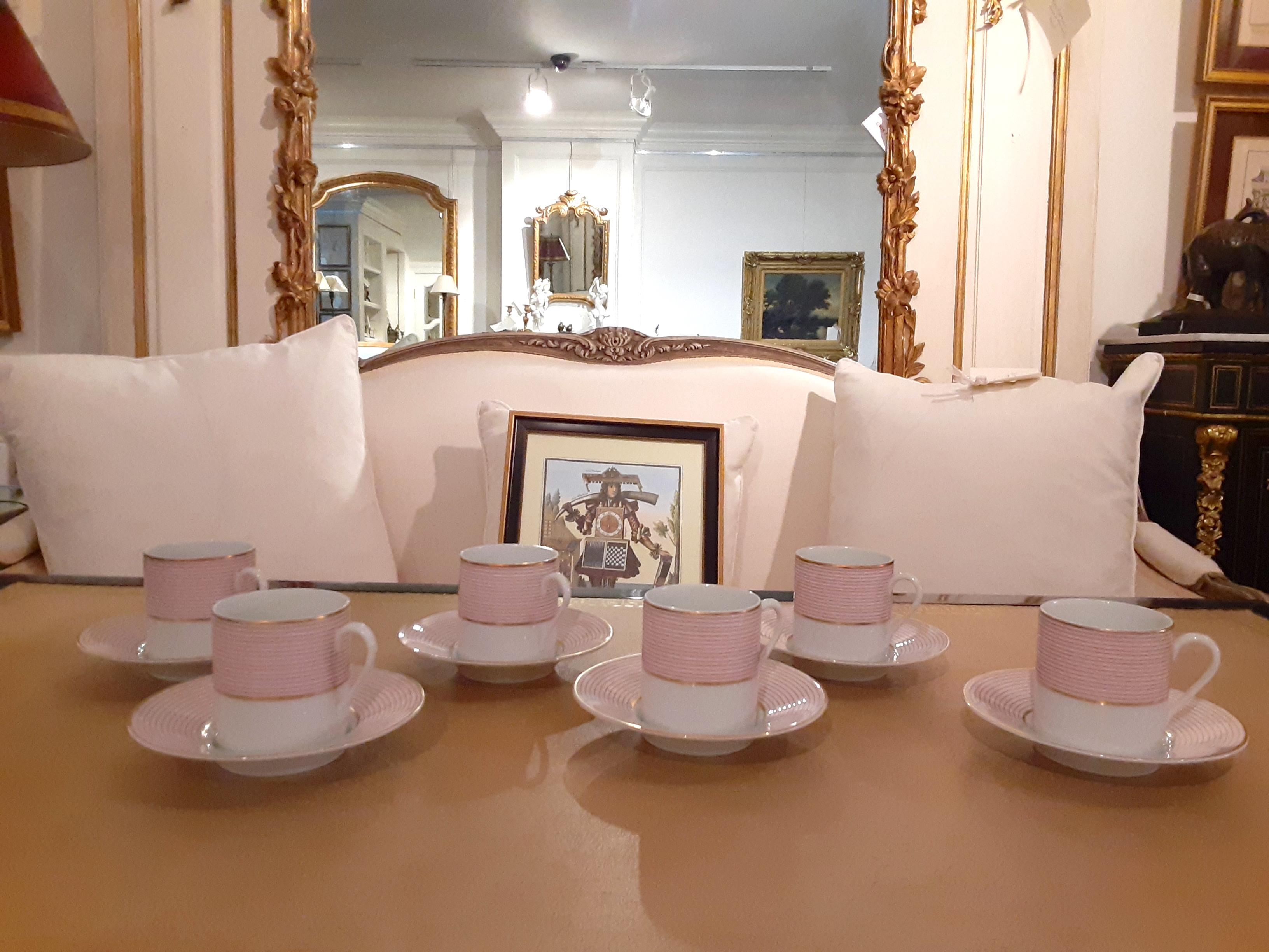 Set of French coffee cups and saucers from la Maison Raynaud, Limoges
White with pink stripes, a truly lovely set.
Set includes:
Measures: Cups (6) 3” W x 2.5” H x 2.25” D
Saucers (6) 4.75” W x 0.75” H.