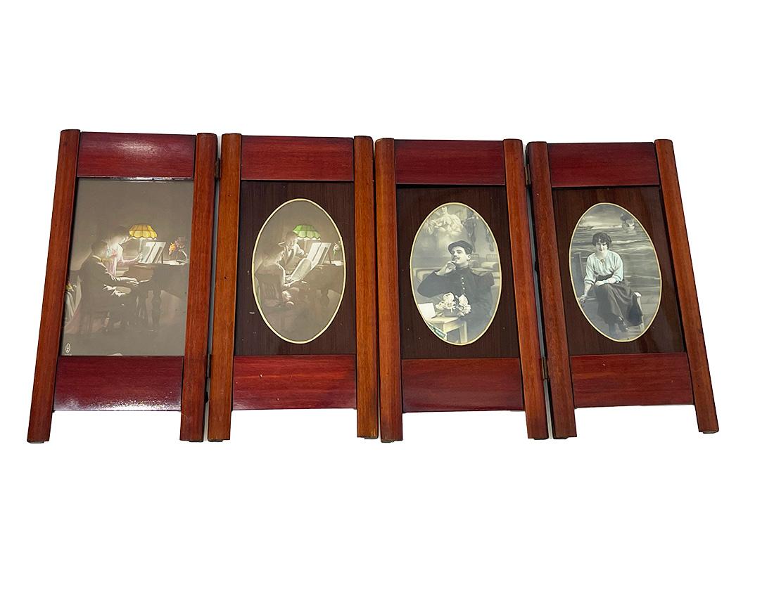 Set of French folding photo frames, ca 1900

A set of French folding photo frames colored in Cherry wood with postcards
The photo frames are filled with colored postcards. One glass is replaced and the three others has an oval shape as display. In